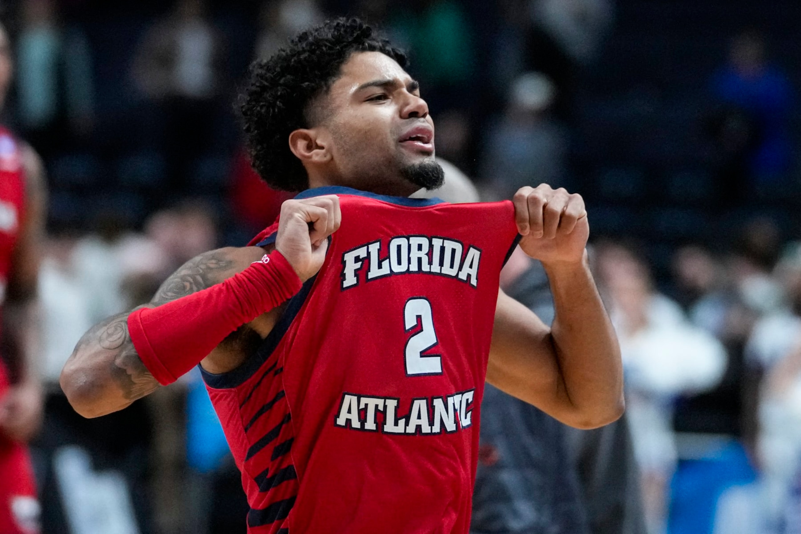 Florida Atlantic guard Nicholas Boyd (2) celebrates after defeating Memphis 66-65 in a first-round college basketball game in the men's NCAA Tournament in Columbus, Ohio, Friday, March 17, 2023. (AP Photo/Michael Conroy)