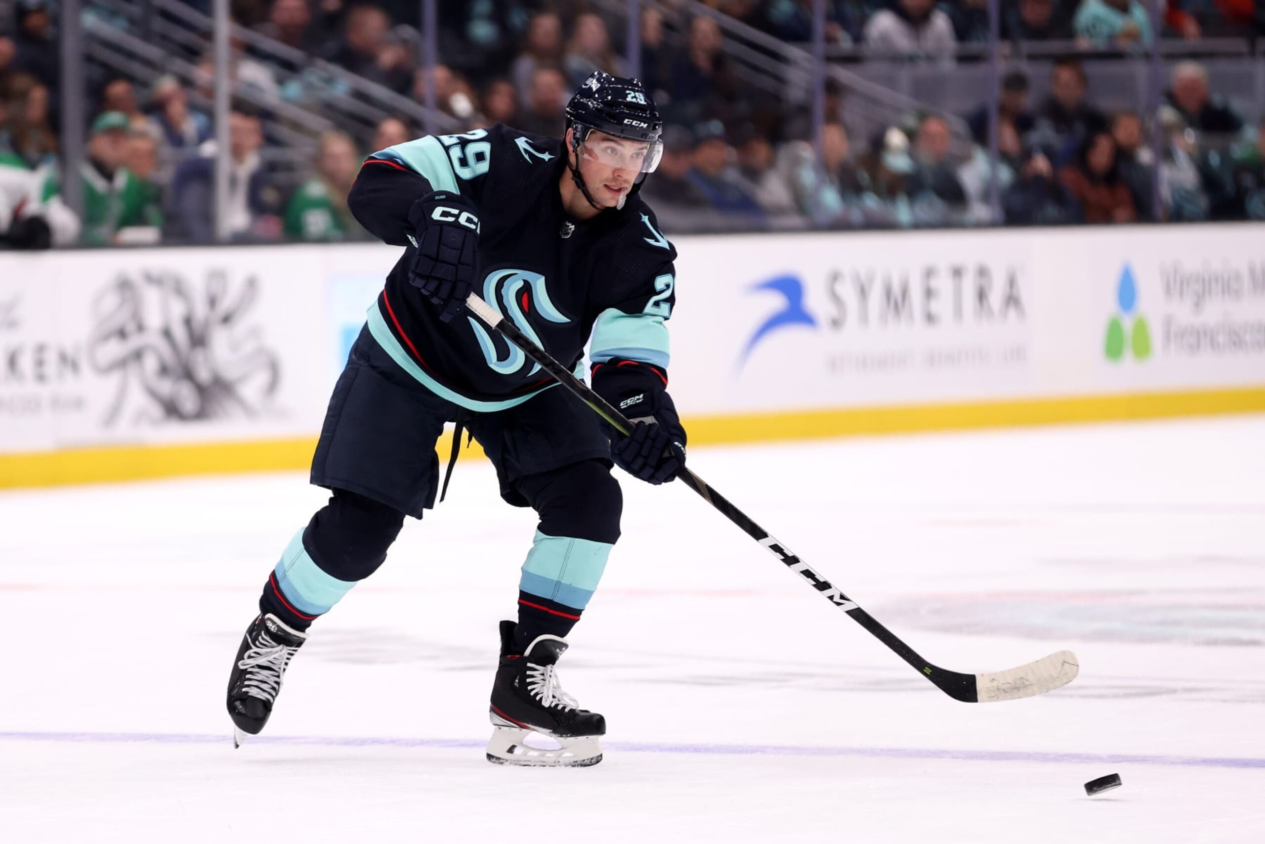 SEATTLE, WASHINGTON - MARCH 13: Vince Dunn #29 of the Seattle Kraken skates against the Dallas Stars during the second period at Climate Pledge Arena on March 13, 2023 in Seattle, Washington. (Photo by Steph Chambers/Getty Images)