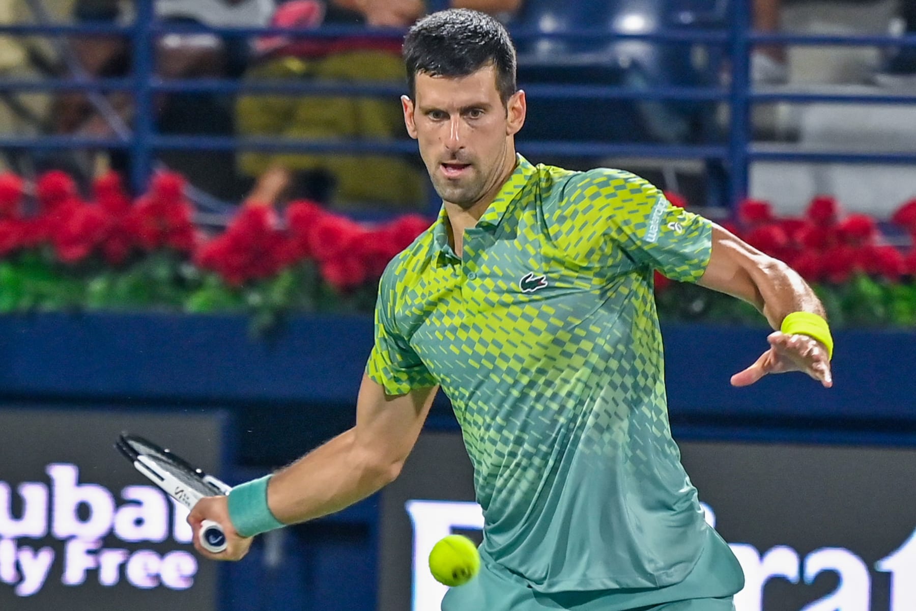 DUBAI, UNITED ARAB EMIRATES - MARCH 03: Novak Djokovic of Serbia competes with Daniil Medvedev of Russia (not seen) during men's single quarter final match of Dubai Duty Free Tennis Championship in Dubai, United Arab Emirates on March 03, 2023. (Photo by Waleed Zein/Anadolu Agency via Getty Images)
