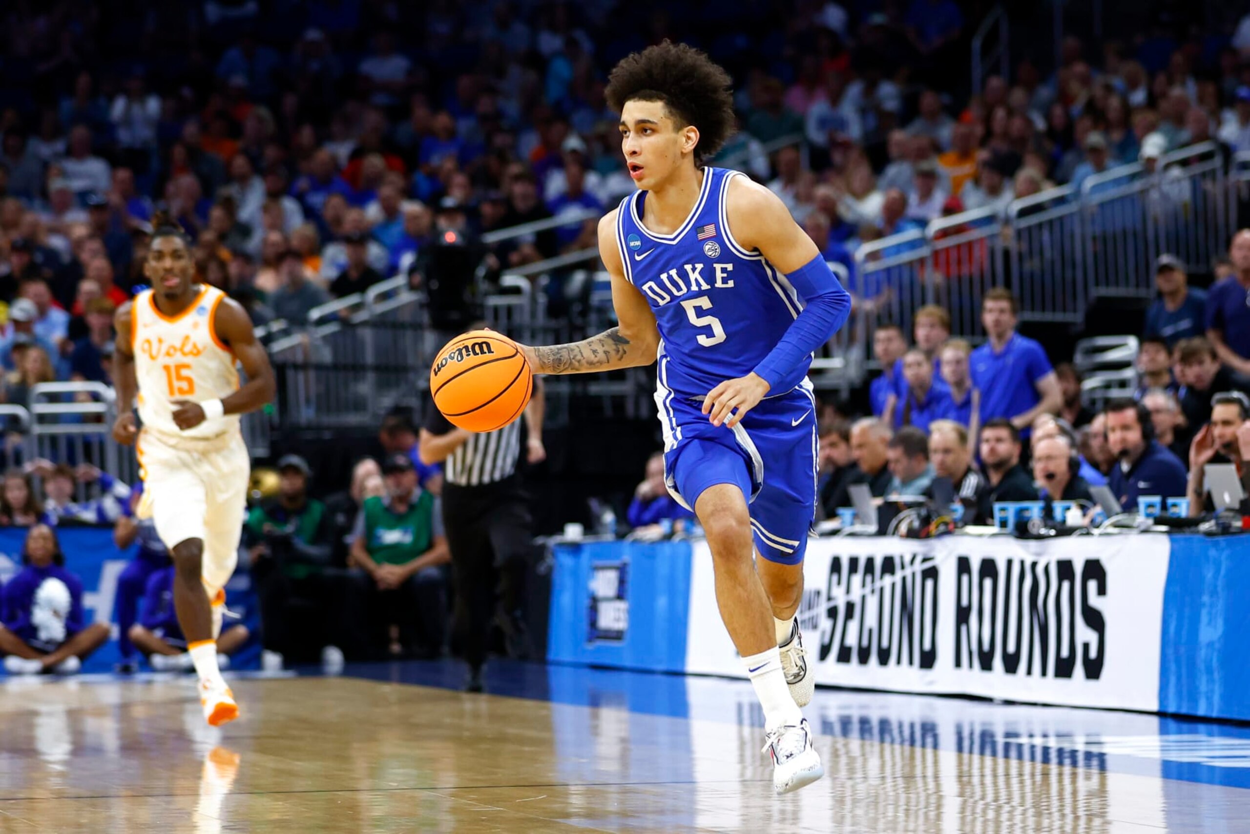 ORLANDO, FLORIDA - MARCH 18: Tyrese Proctor #5 of the Duke Blue Devils dribbles the ball against the Tennessee Volunteers during the first half in the second round of the NCAA Men's Basketball Tournament at Amway Center on March 18, 2023 in Orlando, Florida. (Photo by Kevin Sabitus/Getty Images)