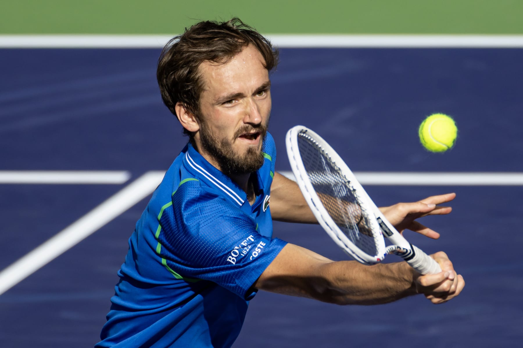 INDIAN WELLS, CALIFORNIA - MARCH 15: Daniil Medvedev of Russia hits a forehand against Alejandro Davidovich Fokina of Spain in the quarter-finals of the BNP Paribas Open on March 15, 2023 in Indian Wells, California. (Photo by Mike Frey/Getty Images)