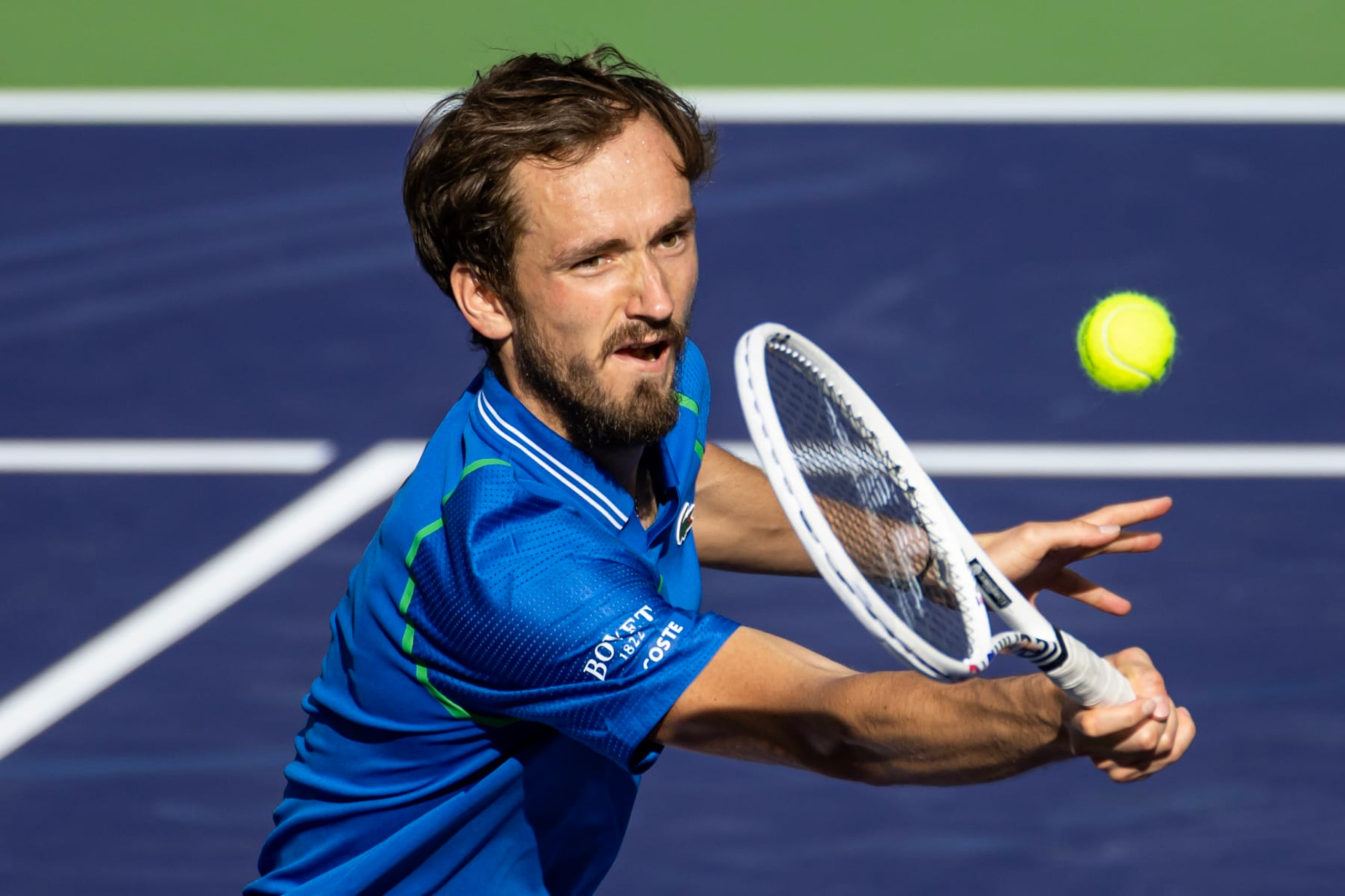 INDIAN WELLS, CALIFORNIA - MARCH 15: Daniil Medvedev of Russia hits a forehand against Alejandro Davidovich Fokina of Spain in the quarter-finals of the BNP Paribas Open on March 15, 2023 in Indian Wells, California. (Photo by Mike Frey/Getty Images)
