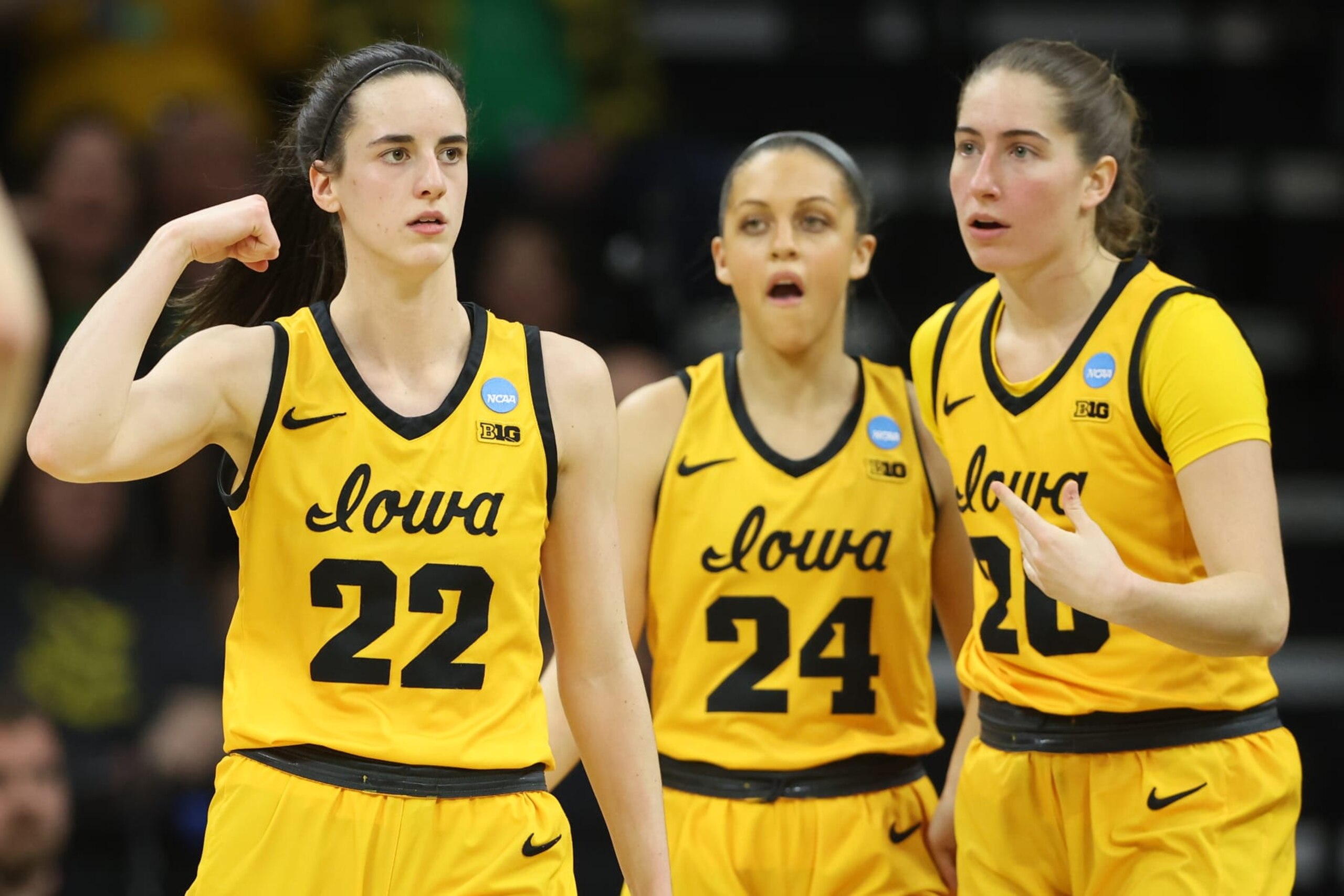 IOWA CITY, IA - MARCH 17: Caitlin Clark #22, Gabbie Marshall #24 and Kate Martin #20, all of the Iowa Hawkeyes, take a breather in the first half against the Southeastern Louisiana Lions  during the first round of the 2023 NCAA Women's Basketball Tournament held at Carver-Hawkeye Arena on March 17, 2023 in Iowa City, Iowa. (Photo by Rebecca Gratz/NCAA Photos via Getty Images)