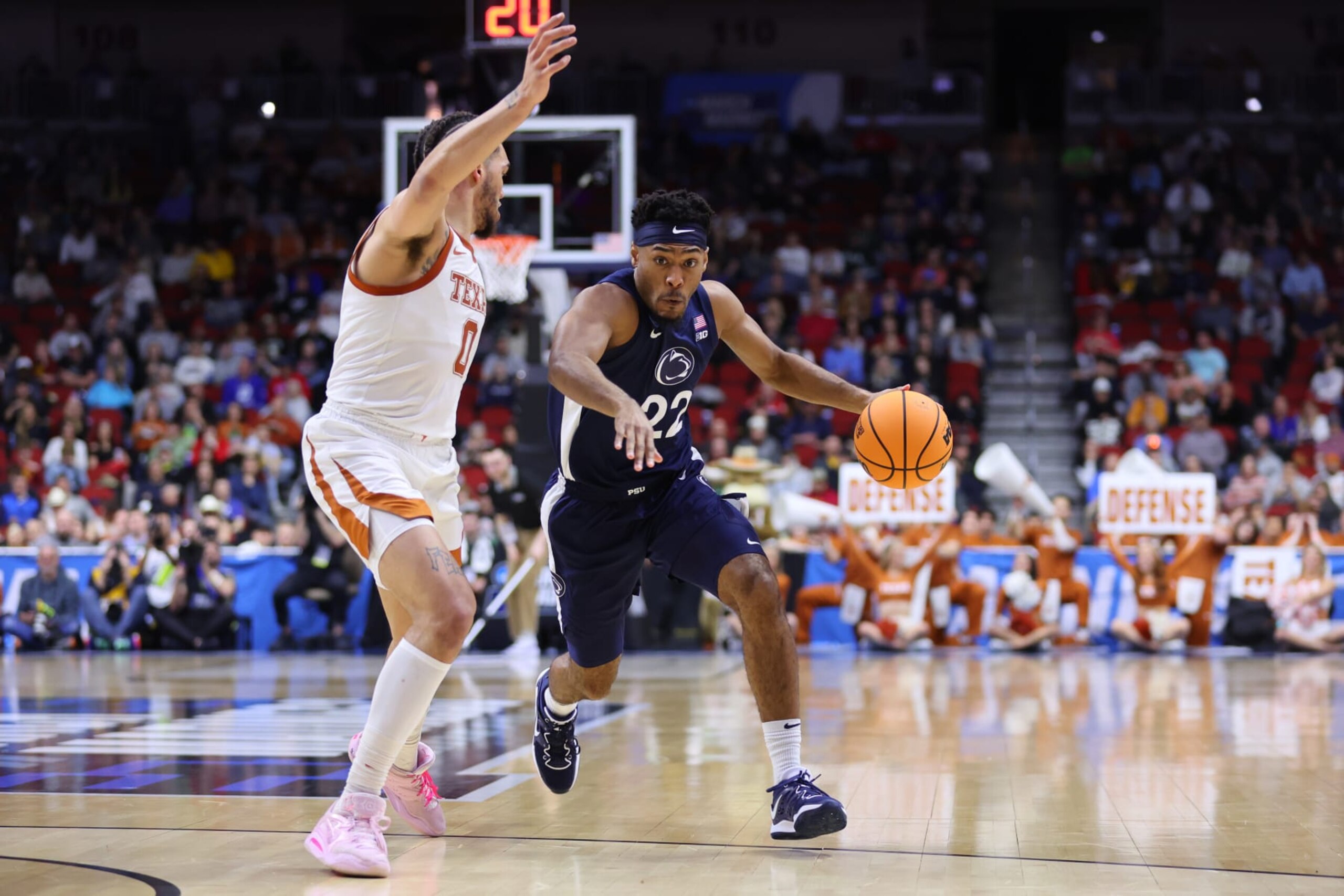 DES MOINES, IOWA - MARCH 18: Jalen Pickett #22 of the Penn State Nittany Lions drives to the basket against Timmy Allen #0 of the Texas Longhorns during the second half in the second round of the NCAA Men's Basketball Tournament at Wells Fargo Arena on March 18, 2023 in Des Moines, Iowa. (Photo by Michael Reaves/Getty Images)