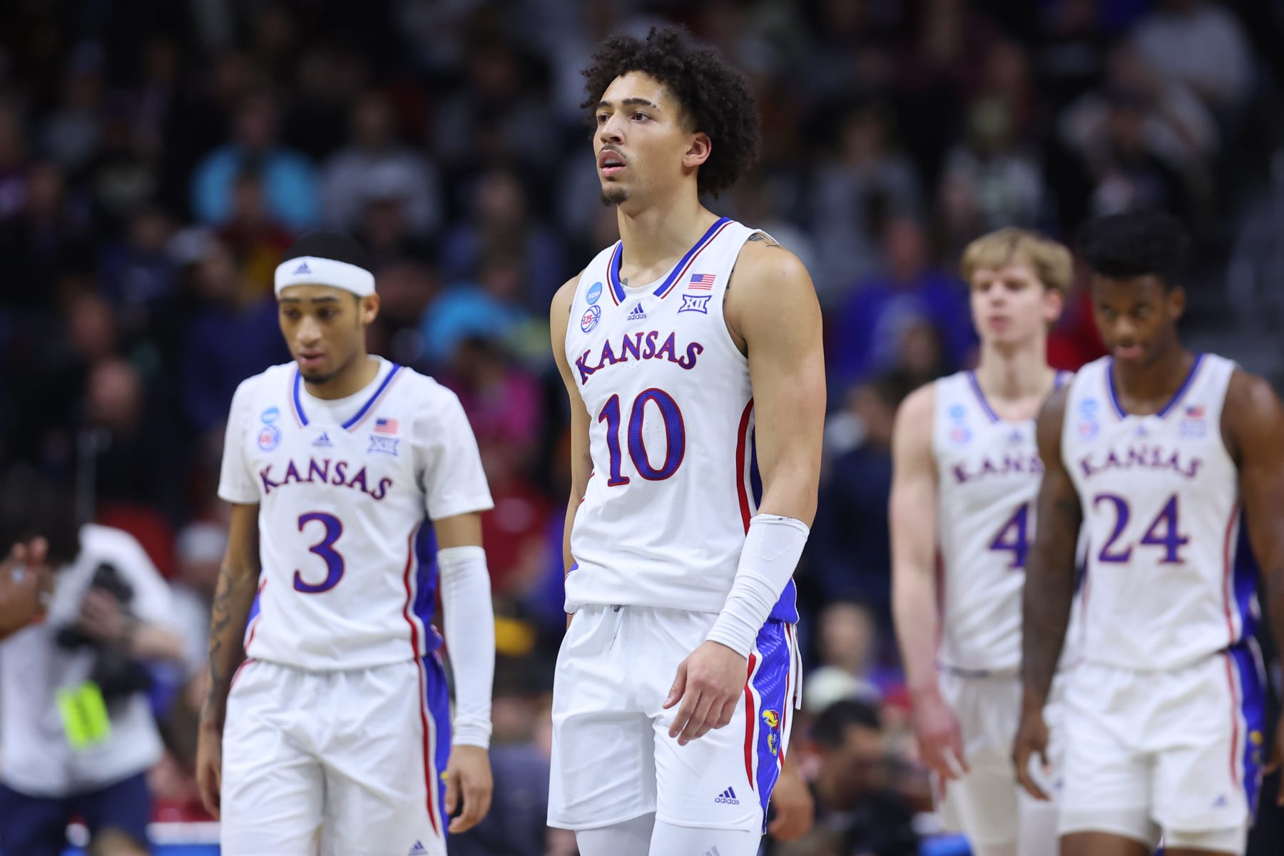 Kansas' Jalen Wilson (10), Dajuan Harris Jr. (3), KJ Adams (24) and Gradey Dick (4)