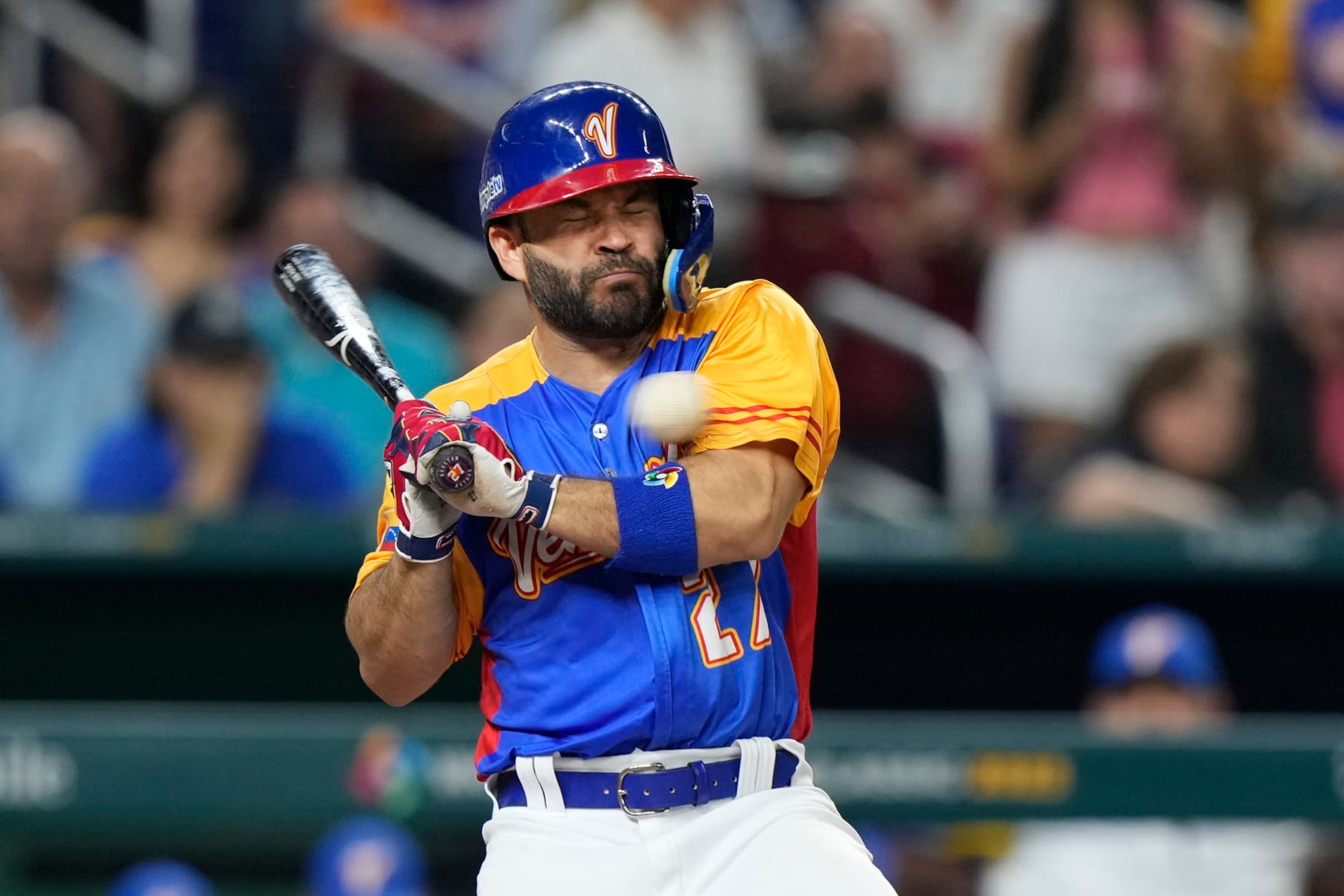 Venezuela's Jose Altuve is hit by a pitch during the fifth inning of a World Baseball Classic game against the U.S., Saturday, March 18, 2023, in Miami. (AP Photo/Wilfredo Lee) Venezuela's Jose Altuve is hit by a pitch during the fifth inning of a World Baseball Classic game against the U.S., Saturday, March 18, 2023, in Miami. (AP Photo/Wilfredo Lee)