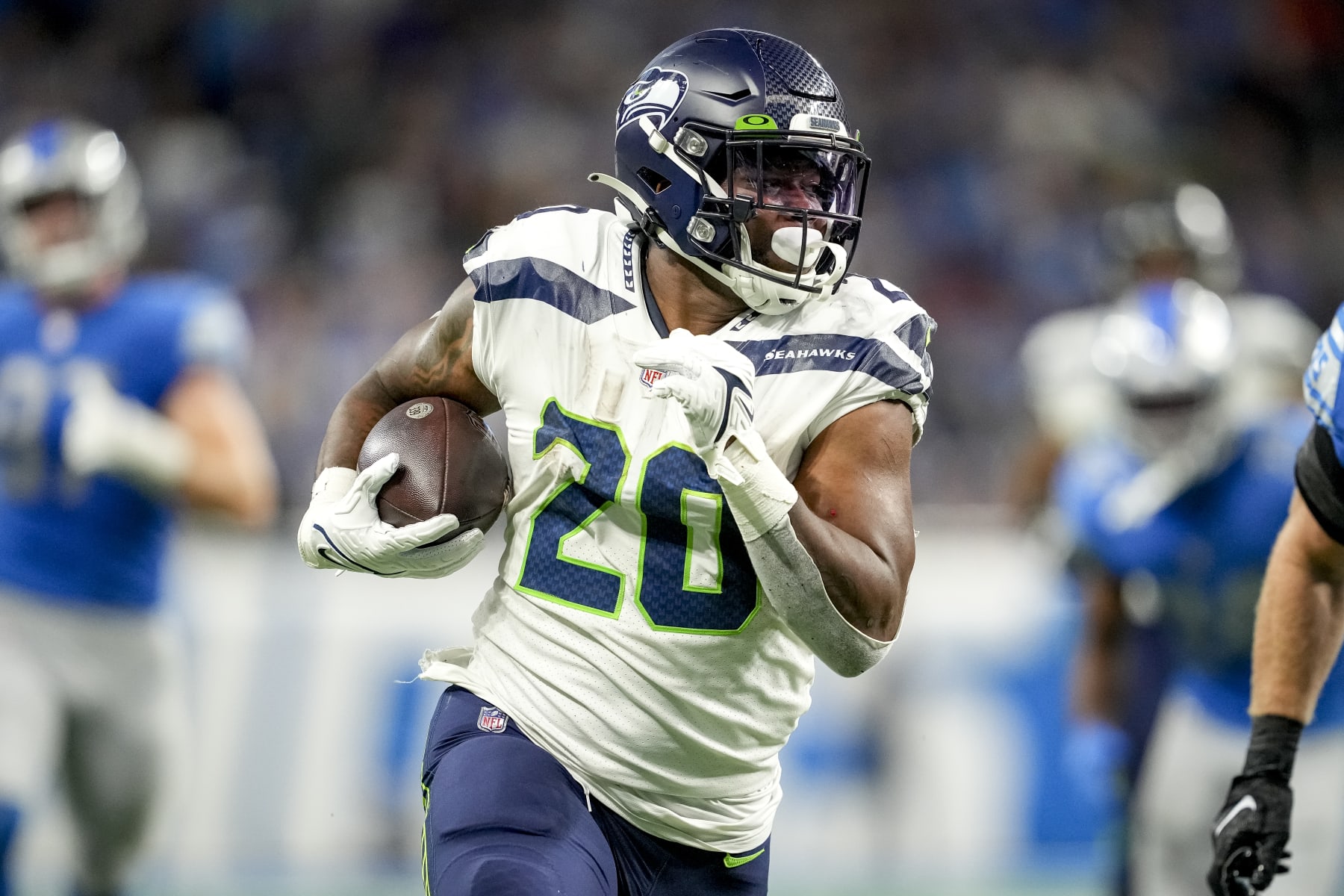 DETROIT, MICHIGAN - OCTOBER 02: Rashaad Penny #20 of the Seattle Seahawks runs the ball against the Detroit Lions at Ford Field on October 2, 2022 in Detroit, Michigan. (Photo by Nic Antaya/Getty Images)