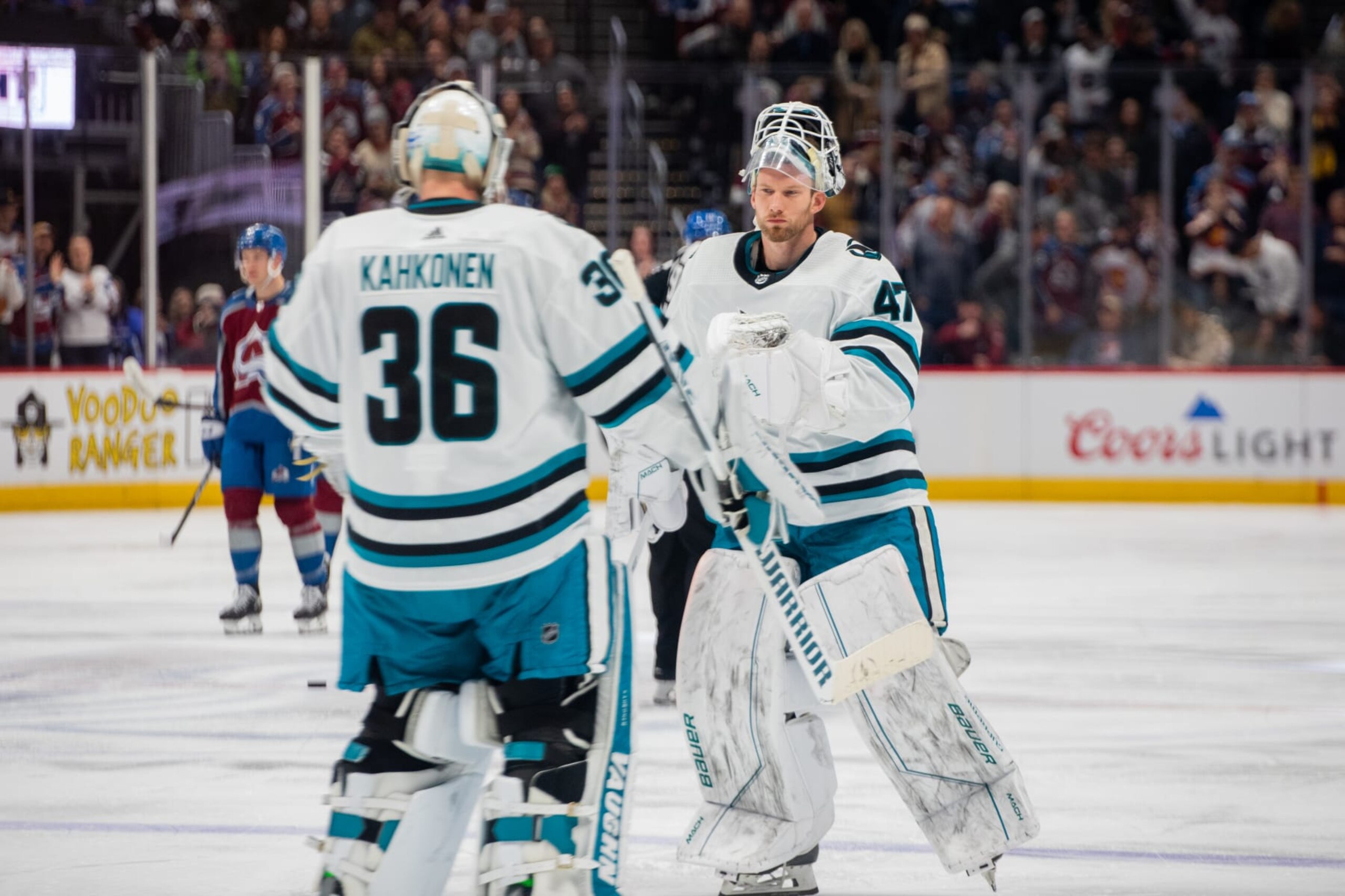 San Jose Sharks goaltenders Kaapo Kähkönen (left) and James Reimer