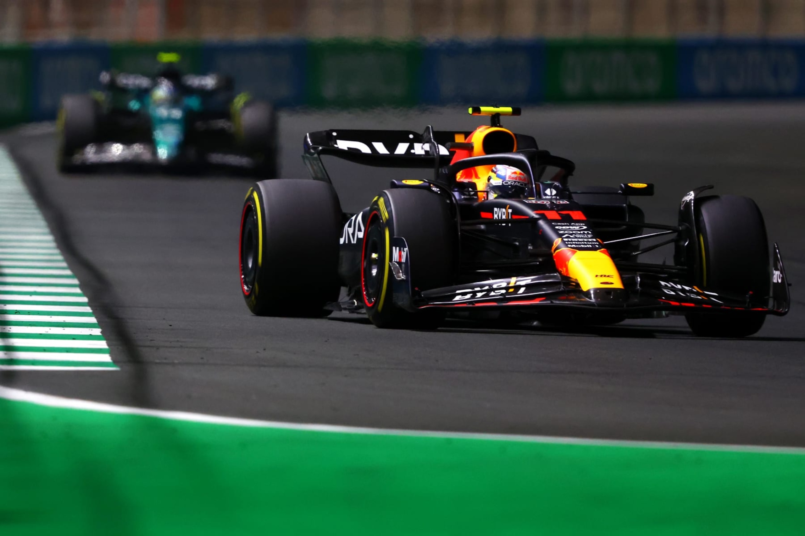 JEDDAH, SAUDI ARABIA - MARCH 19: Sergio Perez of Mexico driving the (11) Oracle Red Bull Racing RB19 on track during the F1 Grand Prix of Saudi Arabia at Jeddah Corniche Circuit on March 19, 2023 in Jeddah, Saudi Arabia. (Photo by Bryn Lennon - Formula 1/Formula 1 via Getty Images) JEDDAH, SAUDI ARABIA - MARCH 19: Sergio Perez of Mexico driving the (11) Oracle Red Bull Racing RB19 on track during the F1 Grand Prix of Saudi Arabia at Jeddah Corniche Circuit on March 19, 2023 in Jeddah, Saudi Arabia. (Photo by Bryn Lennon - Formula 1/Formula 1 via Getty Images)