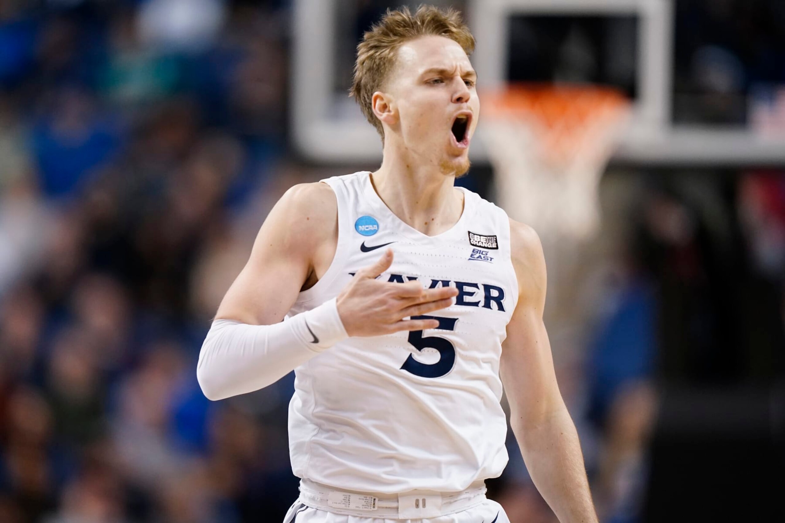 GREENSBORO, NORTH CAROLINA - MARCH 19: Adam Kunkel #5 of the Xavier Musketeers reacts after making a three-point basket during the first half against the Pittsburgh Panthers in the second round of the NCAA Men's Basketball Tournament at The Fieldhouse at Greensboro Coliseum on March 19, 2023 in Greensboro, North Carolina. (Photo by Jacob Kupferman/Getty Images)