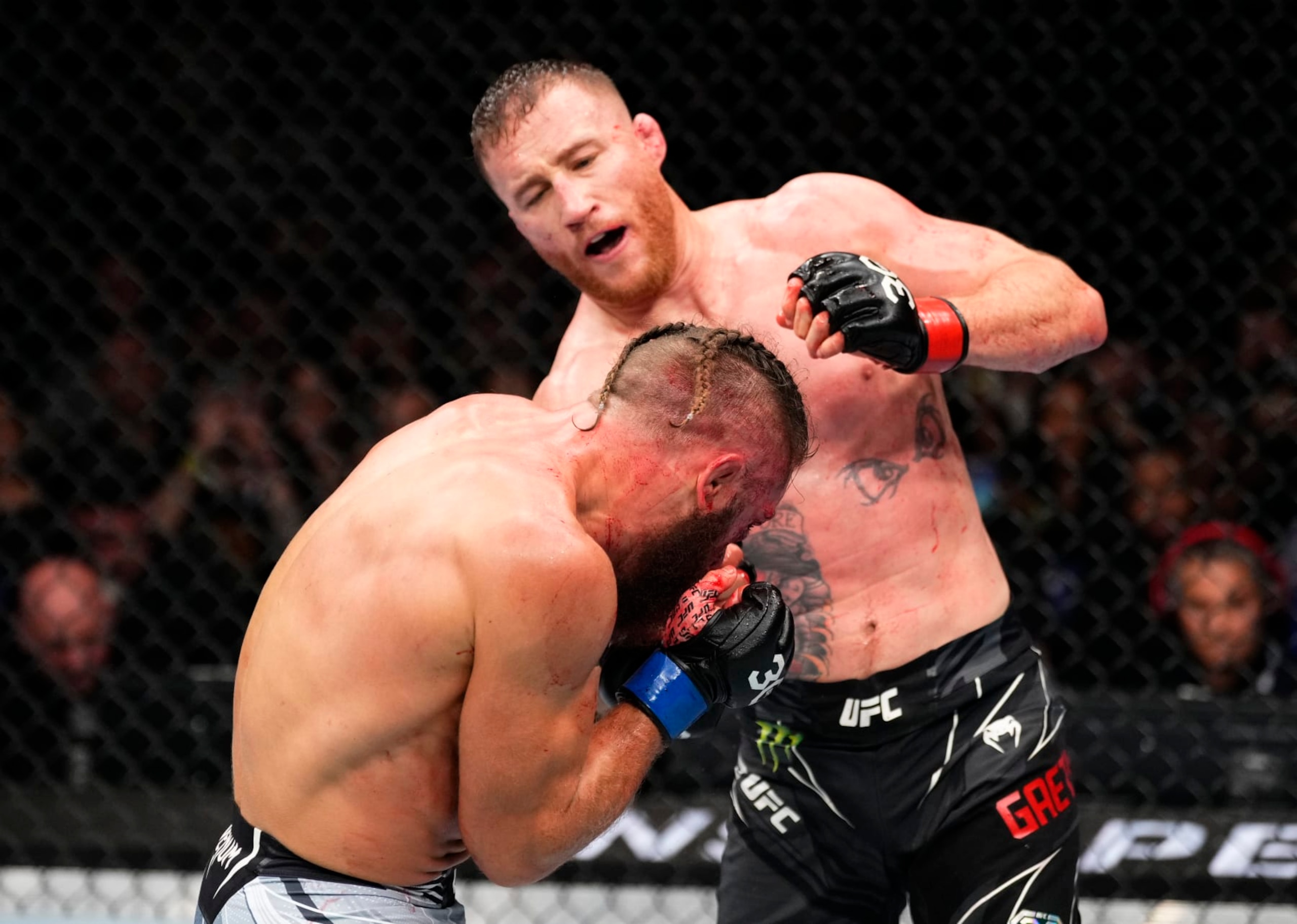 Justin Gaethje punches Rafael Fiziev