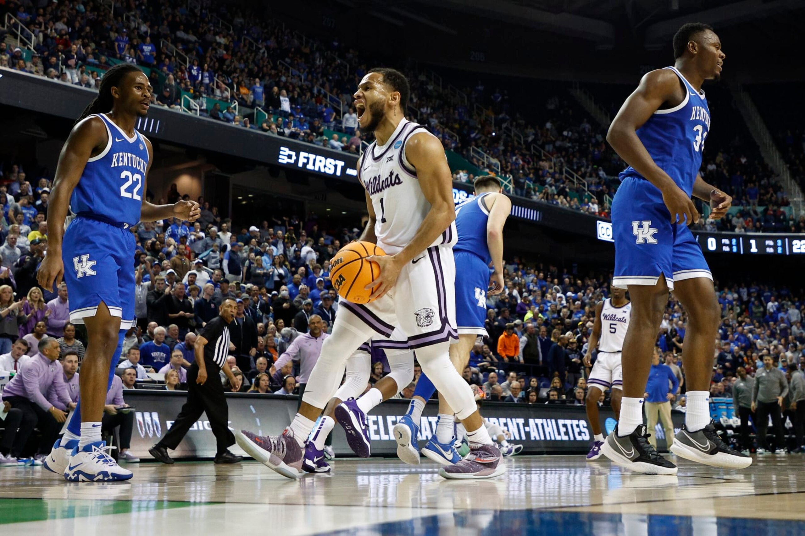 GREENSBORO, NORTH CAROLINA - MARCH 19: Markquis Nowell #1 of the Kansas State Wildcats reacts during the second half against the Kentucky Wildcats in the second round of the NCAA Men's Basketball Tournament at The Fieldhouse at Greensboro Coliseum on March 19, 2023 in Greensboro, North Carolina. (Photo by Jared C. Tilton/Getty Images)
