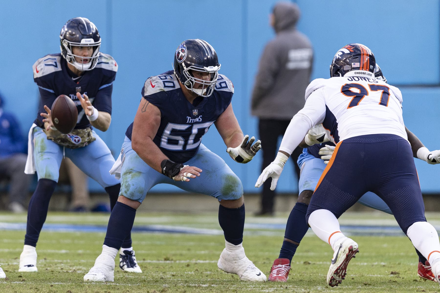 Tennessee Titans center Ben Jones (60) blocks during their game against the Denver Broncos, Sunday, Nov. 13, 2022, in Nashville, Tenn. (AP Photo/Wade Payne)