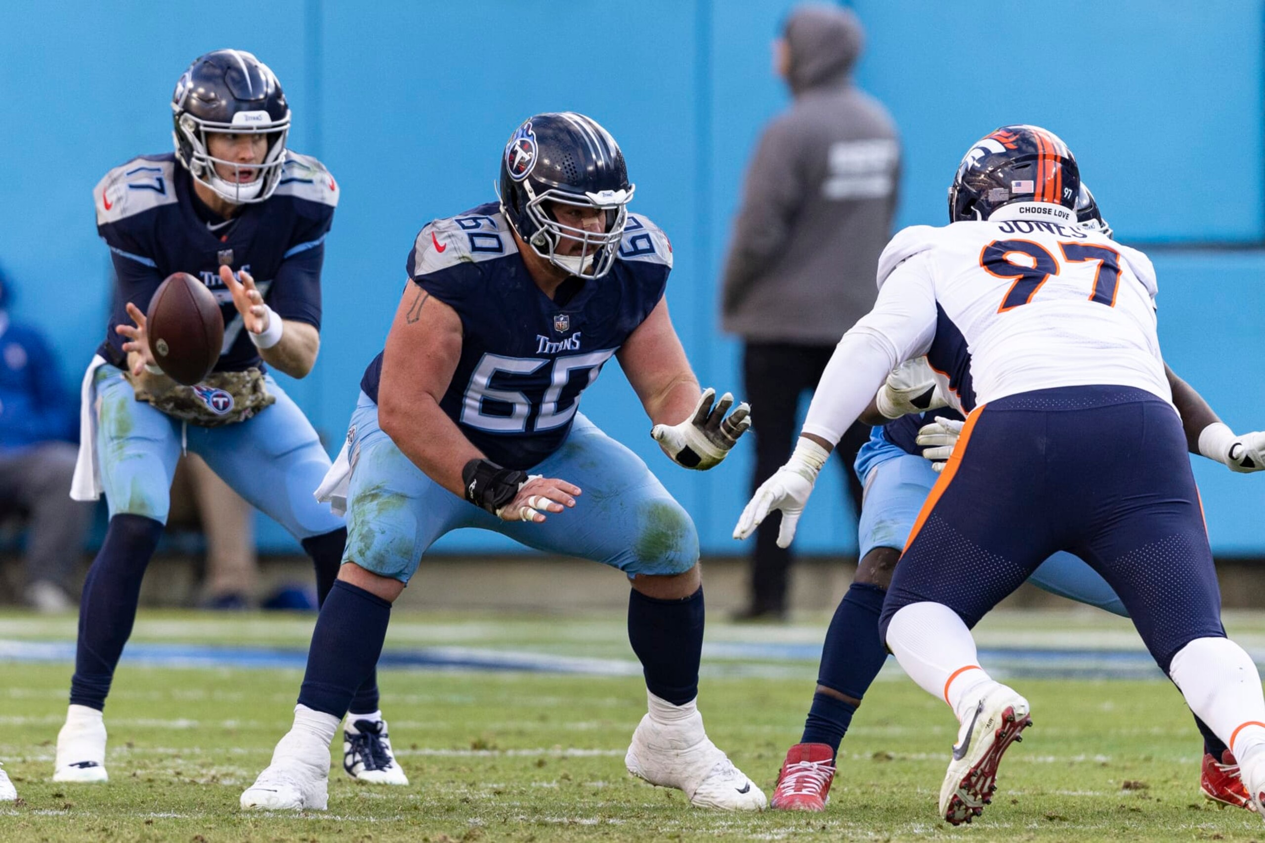 Tennessee Titans center Ben Jones (60) blocks during their game against the Denver Broncos, Sunday, Nov. 13, 2022, in Nashville, Tenn. (AP Photo/Wade Payne)