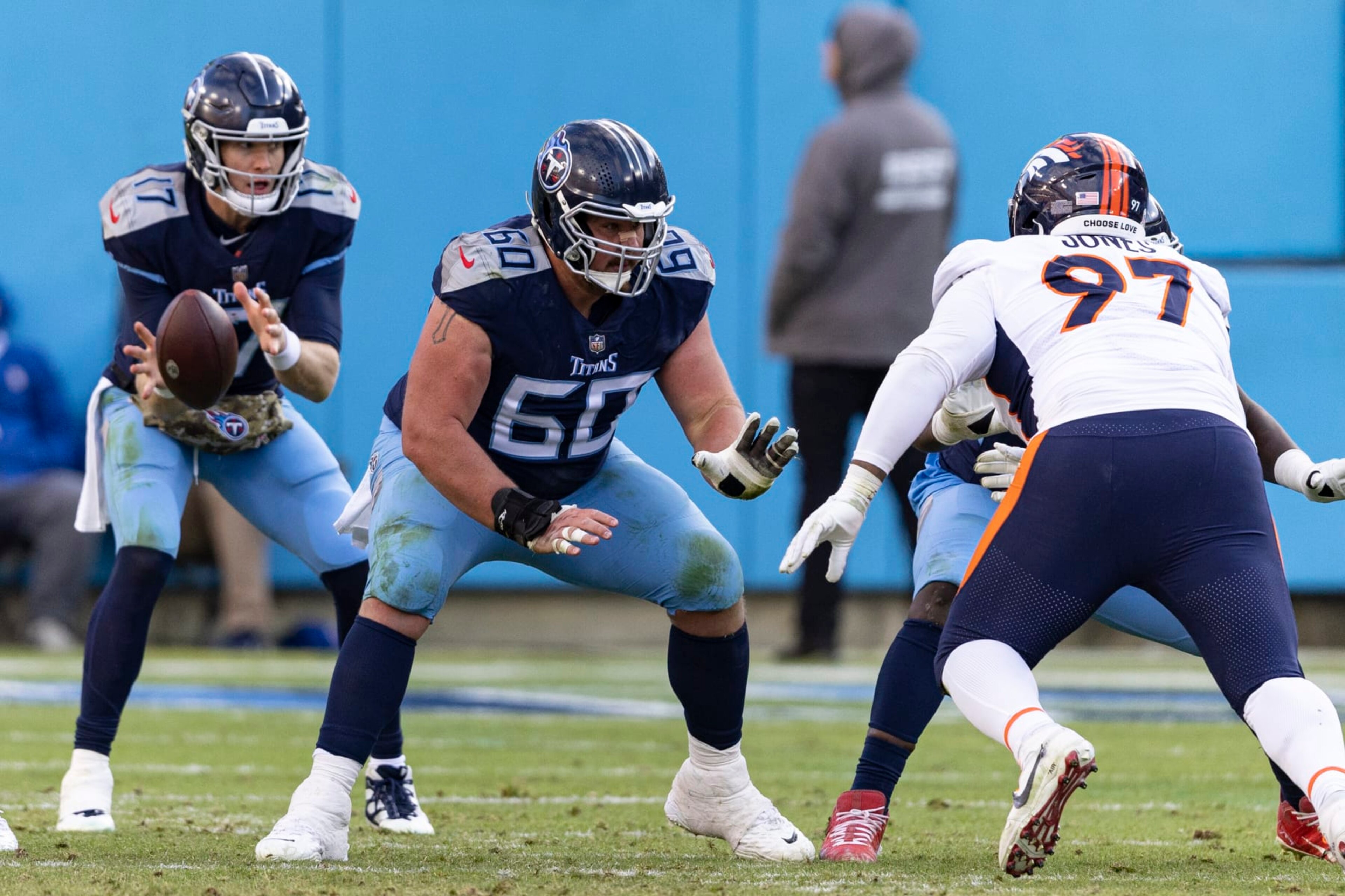 Tennessee Titans center Ben Jones (60) blocks during their game against the Denver Broncos, Sunday, Nov. 13, 2022, in Nashville, Tenn. (AP Photo/Wade Payne)