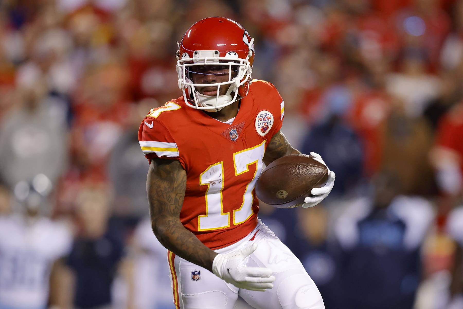 KANSAS CITY, MISSOURI - NOVEMBER 06: Mecole Hardman #17 of the Kansas City Chiefs runs with the ball against the Tennessee Titans in the first half at Arrowhead Stadium on November 06, 2022 in Kansas City, Missouri. (Photo by David Eulitt/Getty Images)