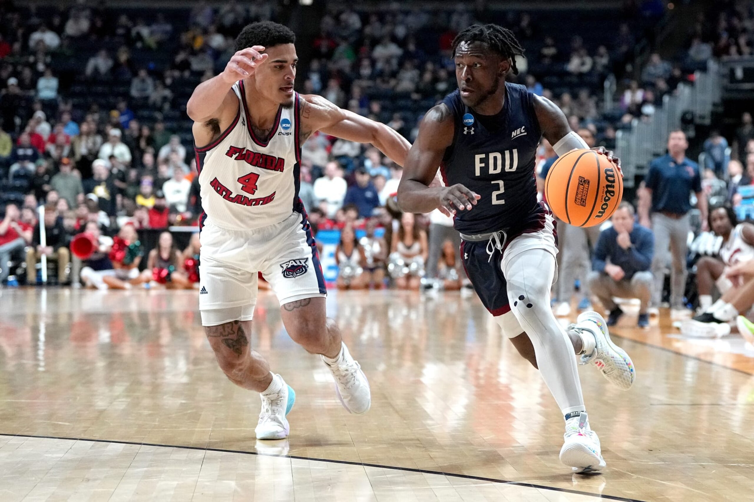 COLUMBUS, OHIO - MARCH 19: Demetre Roberts #2 of the Fairleigh Dickinson Knights drives to the basket against Bryan Greenlee #4 of the Florida Atlantic Owls during the second half in the second round game of the NCAA Men's Basketball Tournament at Nationwide Arena on March 19, 2023 in Columbus, Ohio. (Photo by Dylan Buell/Getty Images)