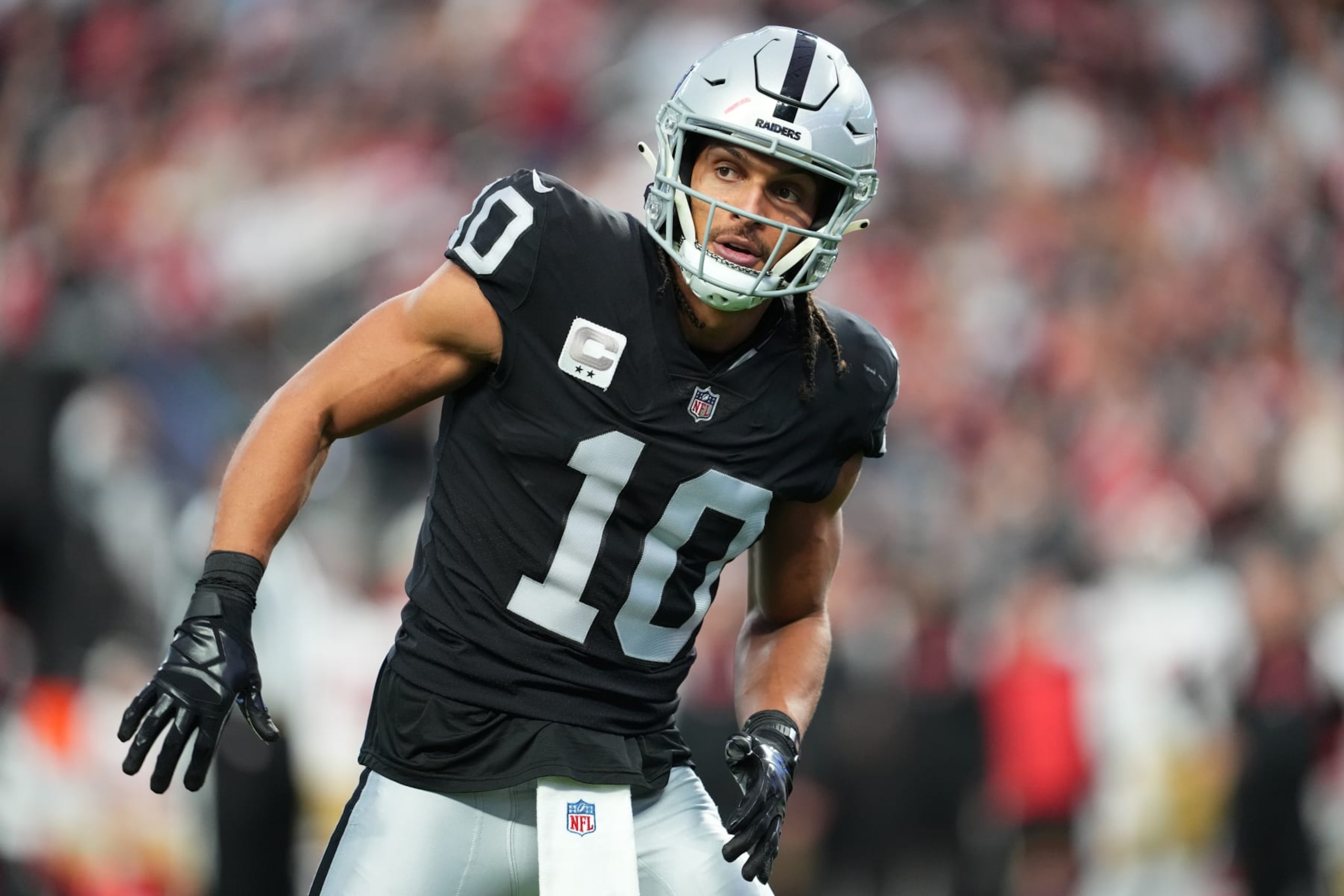 LAS VEGAS, NEVADA - JANUARY 01: Wide receiver Mack Hollins #10 of the Las Vegas Raiders prepares for a play during the first half of a game against the San Francisco 49ers at Allegiant Stadium on January 01, 2023 in Las Vegas, Nevada. (Photo by Chris Unger/Getty Images)
