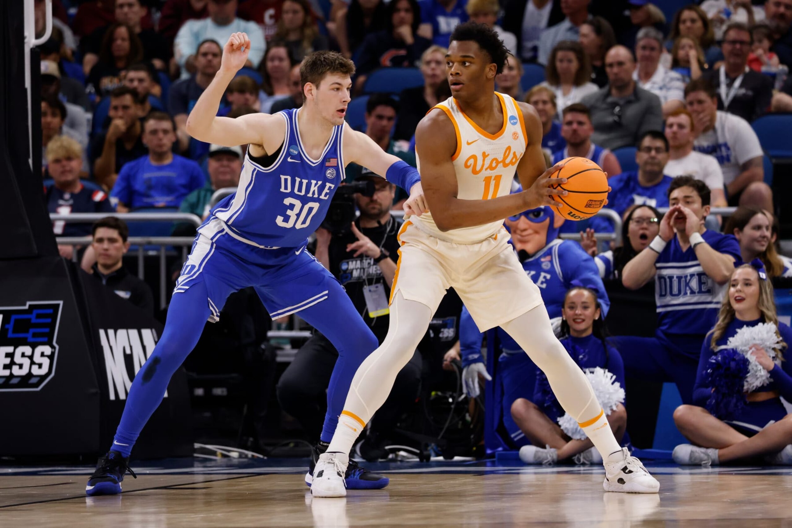 ORLANDO, FL - MARCH 18: Kyle Filipowski #30 of the Duke Blue Devils defends against Tobe Awaka #11 of the Tennessee Volunteers in the second round of the NCAA Men's Basketball Tournament at Amway Center on March 18, 2023 in Orlando, Florida. Tennessee won 65-52. (Photo by Lance King/Getty Images)