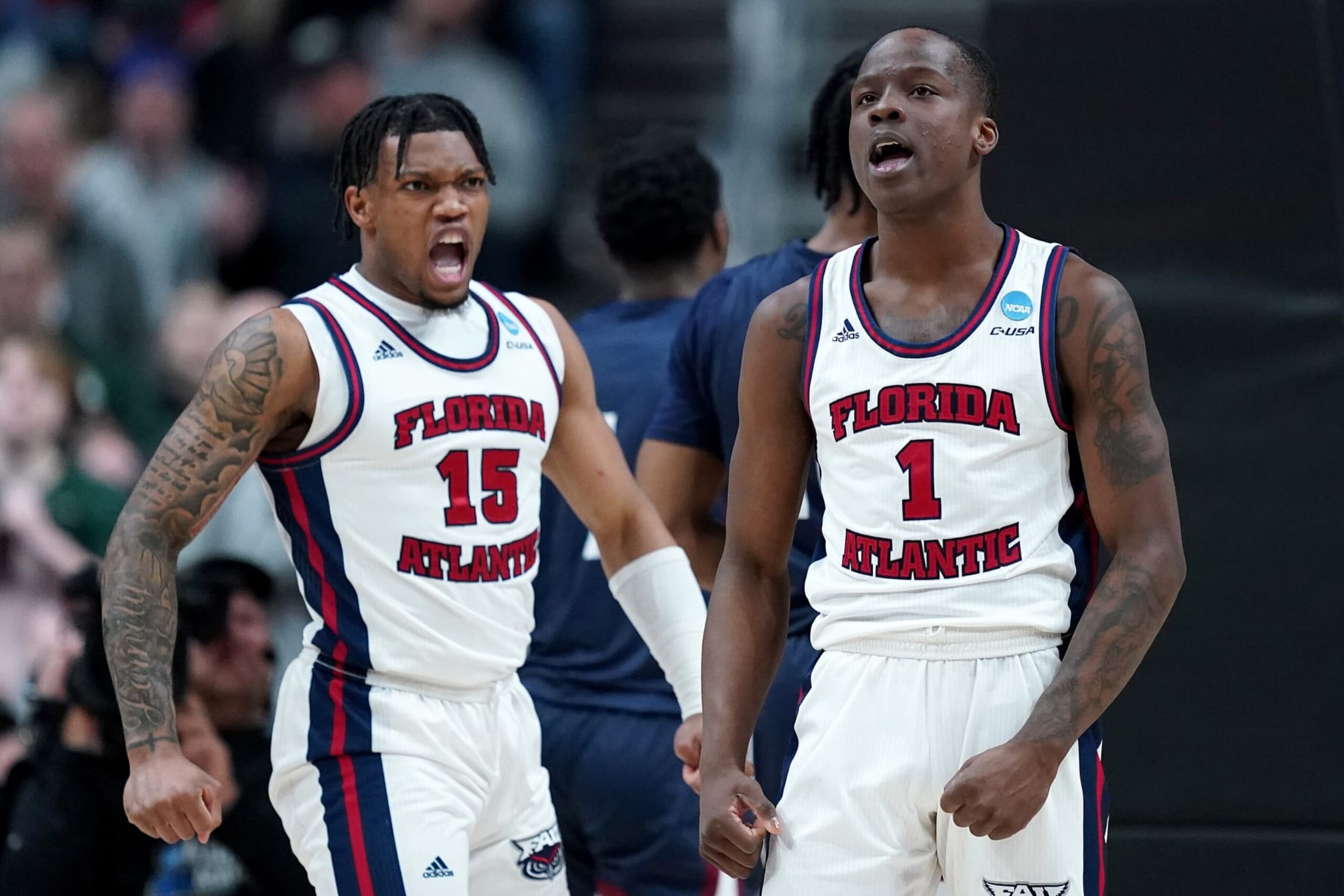 FAU's Johnell Davis (1) and Alijah Martin (15)