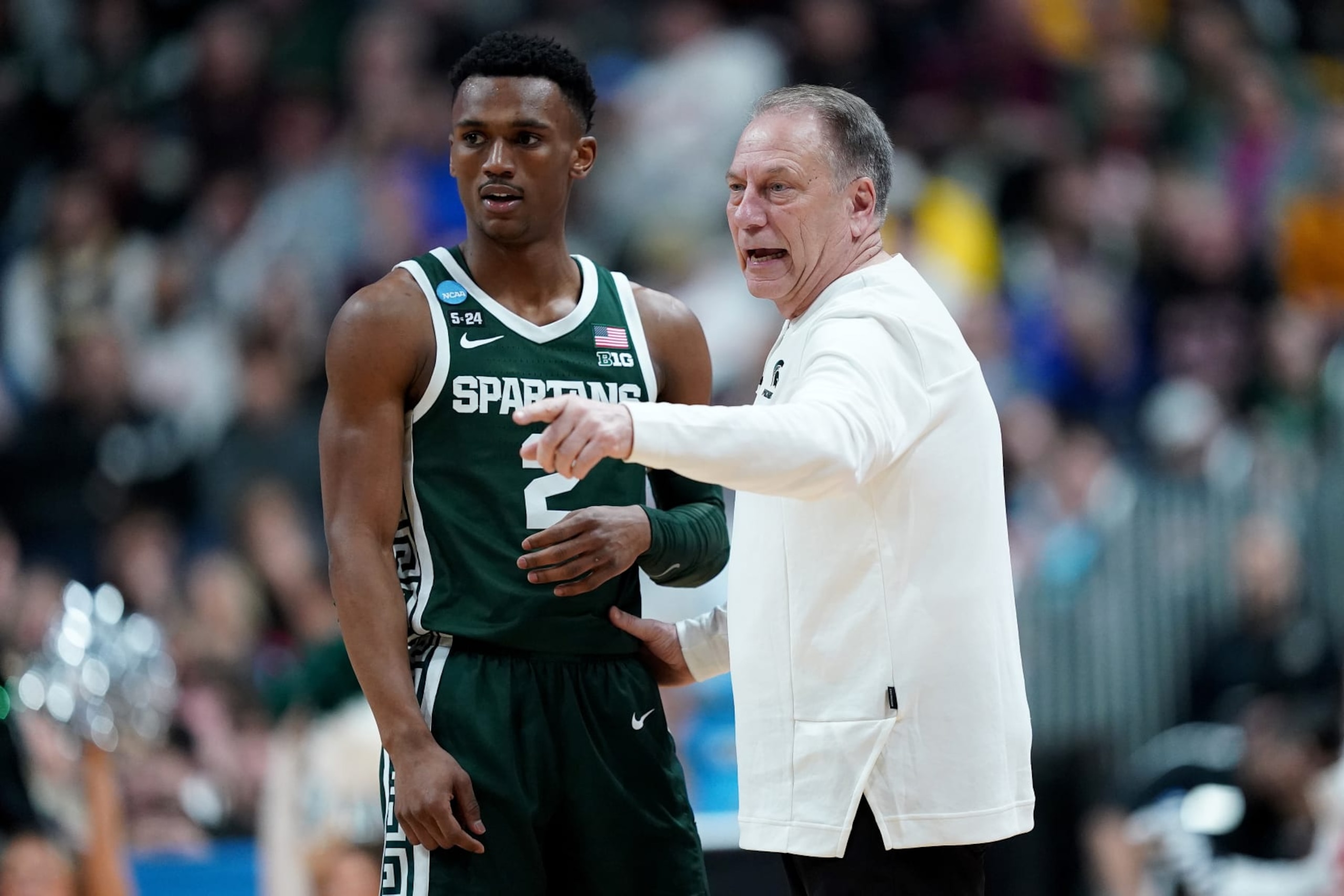 Michigan State's Tyson Walker and Tom Izzo