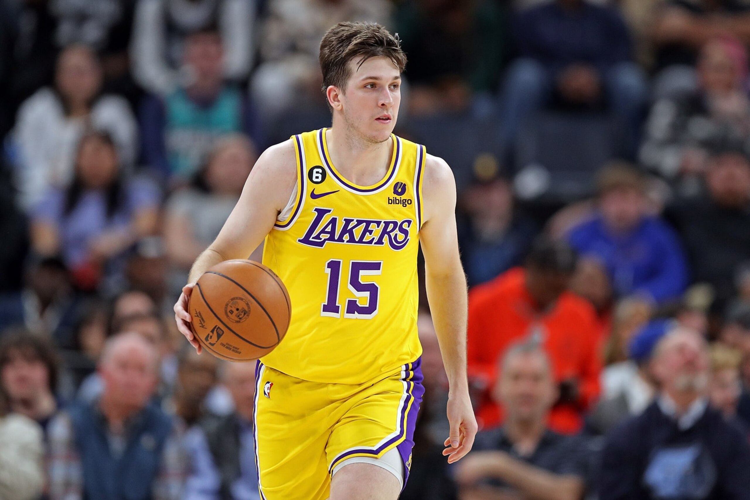 MEMPHIS, TENNESSEE - FEBRUARY 28: Austin Reaves #15 of the Los Angeles Lakers brings the ball up court during the game against the Memphis Grizzlies at FedExForum on February 28, 2023 in Memphis, Tennessee. NOTE TO USER: User expressly acknowledges and agrees that, by downloading and or using this photograph, User is consenting to the terms and conditions of the Getty Images License Agreement. (Photo by Justin Ford/Getty Images)