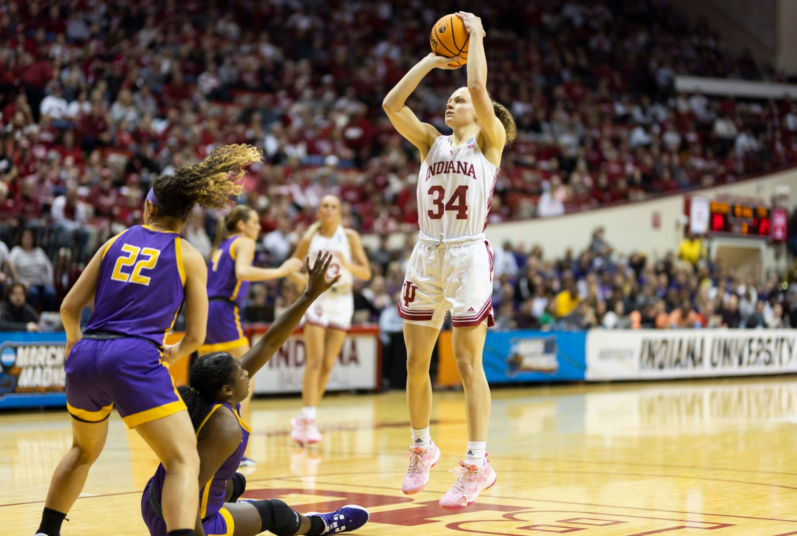 BLOOMINGTON, UNITED STATES - 2023/03/18: Indiana Hoosiers guard Grace Berger (34) shoots against Tennessee Tech Golden Eagles guard Maaliya Owens (11) during an NCAA womens basketball tournament game at Simon Skjodt Assembly Hall. IU beat Tennessee 77-47. (Photo by Jeremy Hogan/SOPA Images/LightRocket via Getty Images)