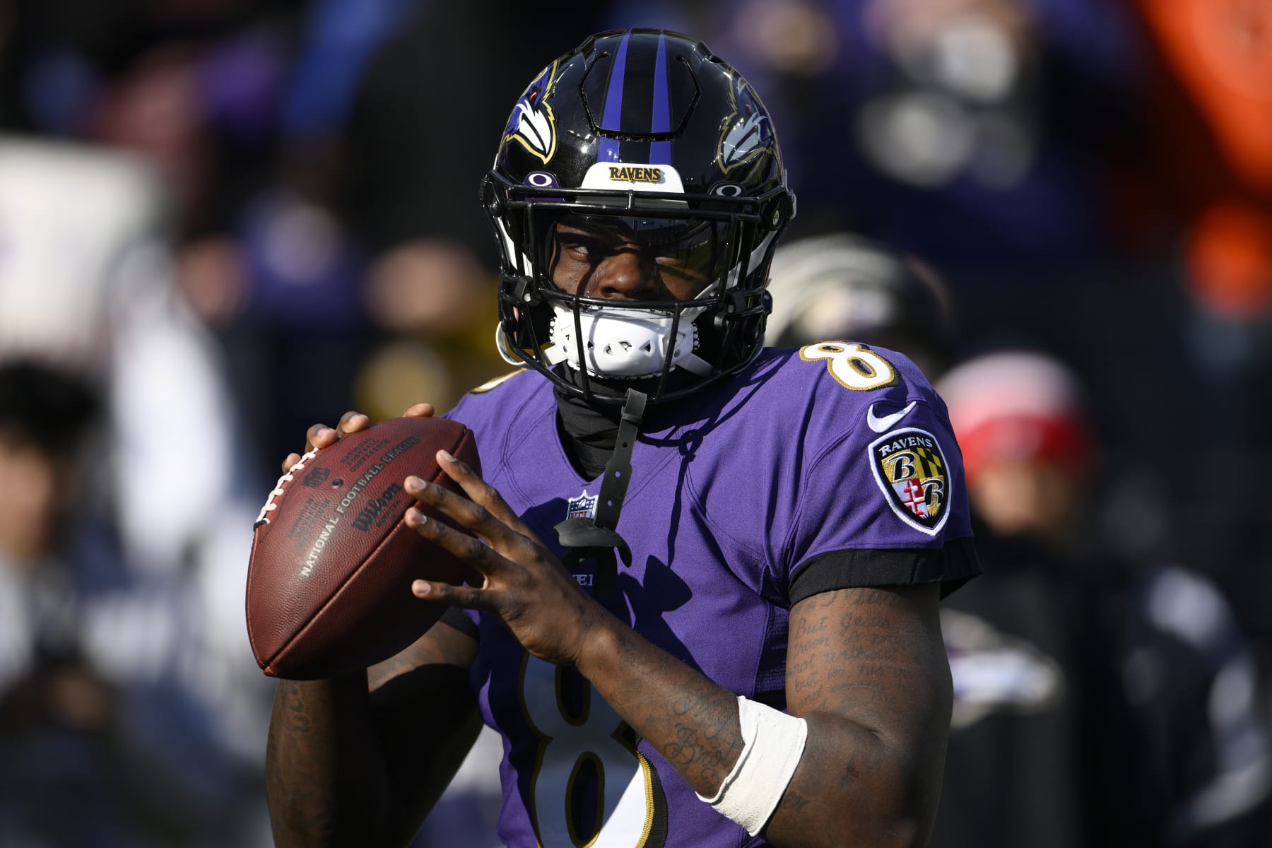 Baltimore Ravens quarterback Lamar Jackson (8) warms up before an NFL football game against the Denver Broncos, Sunday, Dec. 4, 2022, in Baltimore. (AP Photo/Nick Wass)