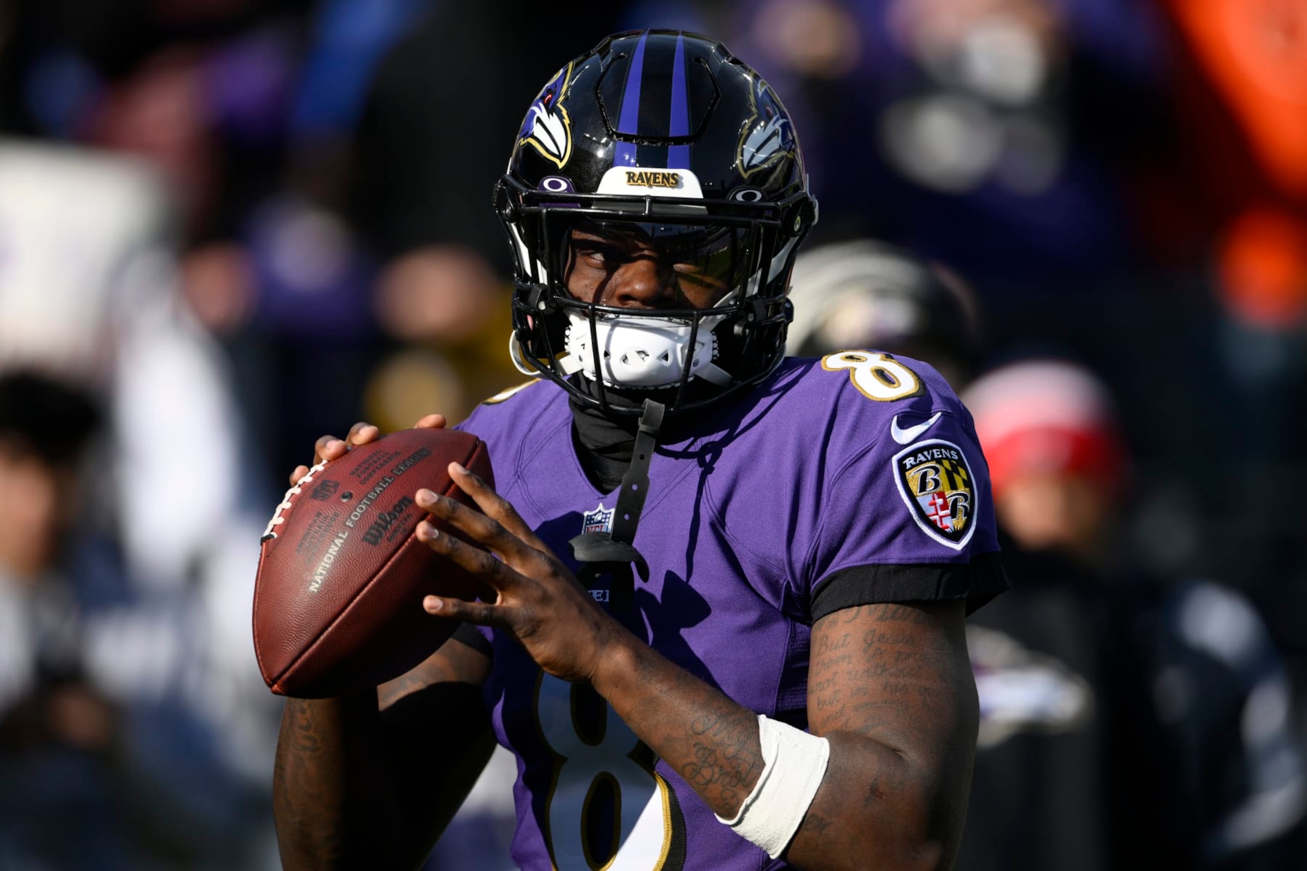 Baltimore Ravens quarterback Lamar Jackson (8) warms up before an NFL football game against the Denver Broncos, Sunday, Dec. 4, 2022, in Baltimore. (AP Photo/Nick Wass)