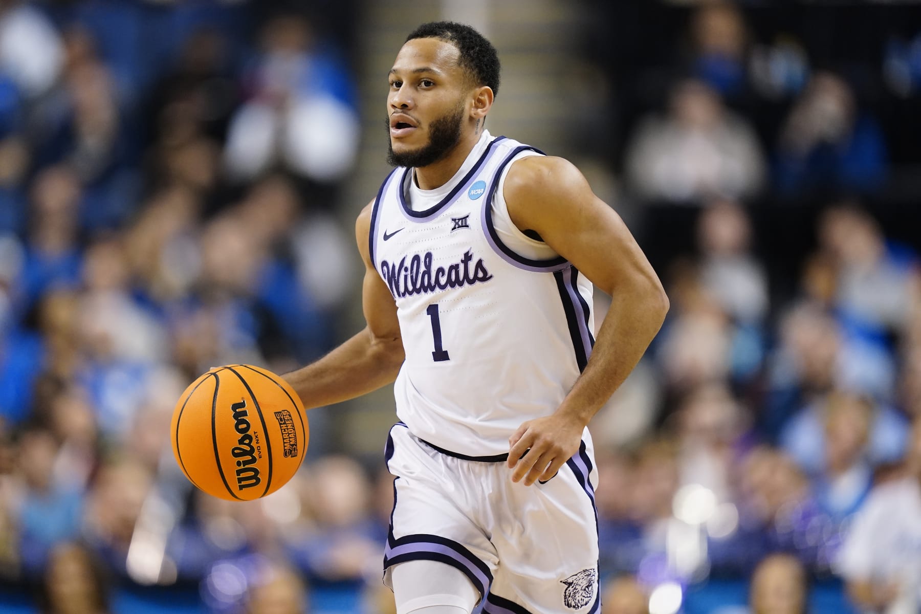 GREENSBORO, NORTH CAROLINA - MARCH 19: Markquis Nowell #1 of the Kansas State Wildcats dribbles the ball during the first half against the Kentucky Wildcats in the second round of the NCAA Men's Basketball Tournament at The Fieldhouse at Greensboro Coliseum on March 19, 2023 in Greensboro, North Carolina. (Photo by Jacob Kupferman/Getty Images)