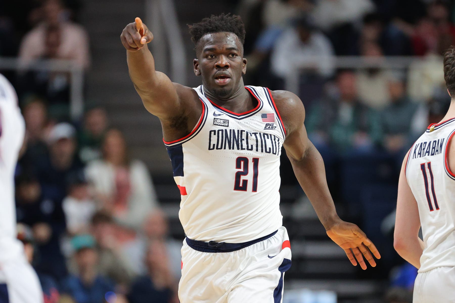 ALBANY, NY - MARCH 19: Adama Sanogo #21 of the Connecticut Huskies gestures as he moves on the court during the second half against the St. Mary's Gaels during the second round of the 2023 NCAA Men's Basketball Tournament held at MVP Arena on March 19, 2023 in Albany, New York. (Photo by C. Morgan Engel/NCAA Photos via Getty Images)
