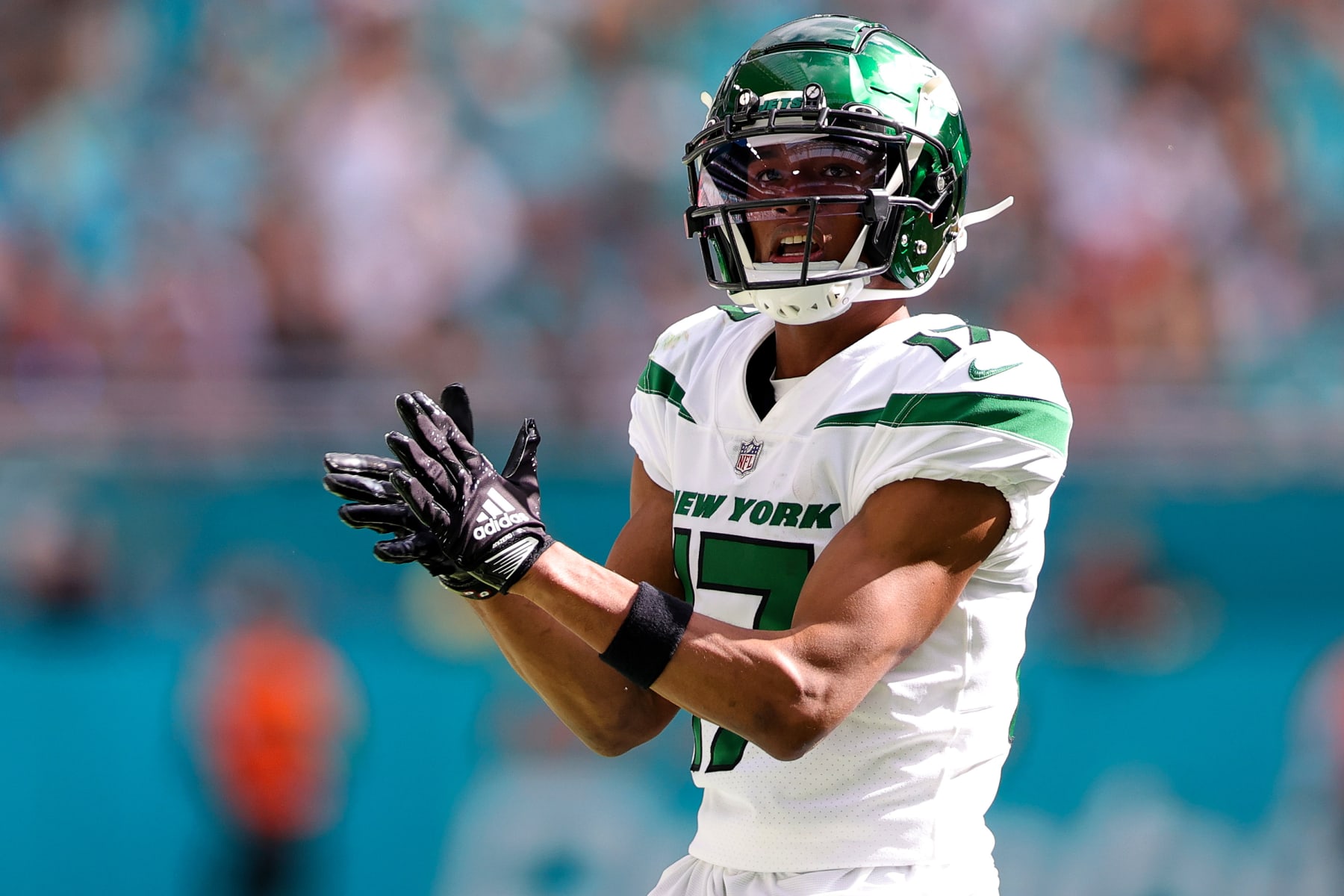 MIAMI GARDENS, FLORIDA - JANUARY 08: Garrett Wilson #17 of the New York Jets reacts after a play against the Miami Dolphins during the first half of the game at Hard Rock Stadium on January 08, 2023 in Miami Gardens, Florida. (Photo by Megan Briggs/Getty Images)