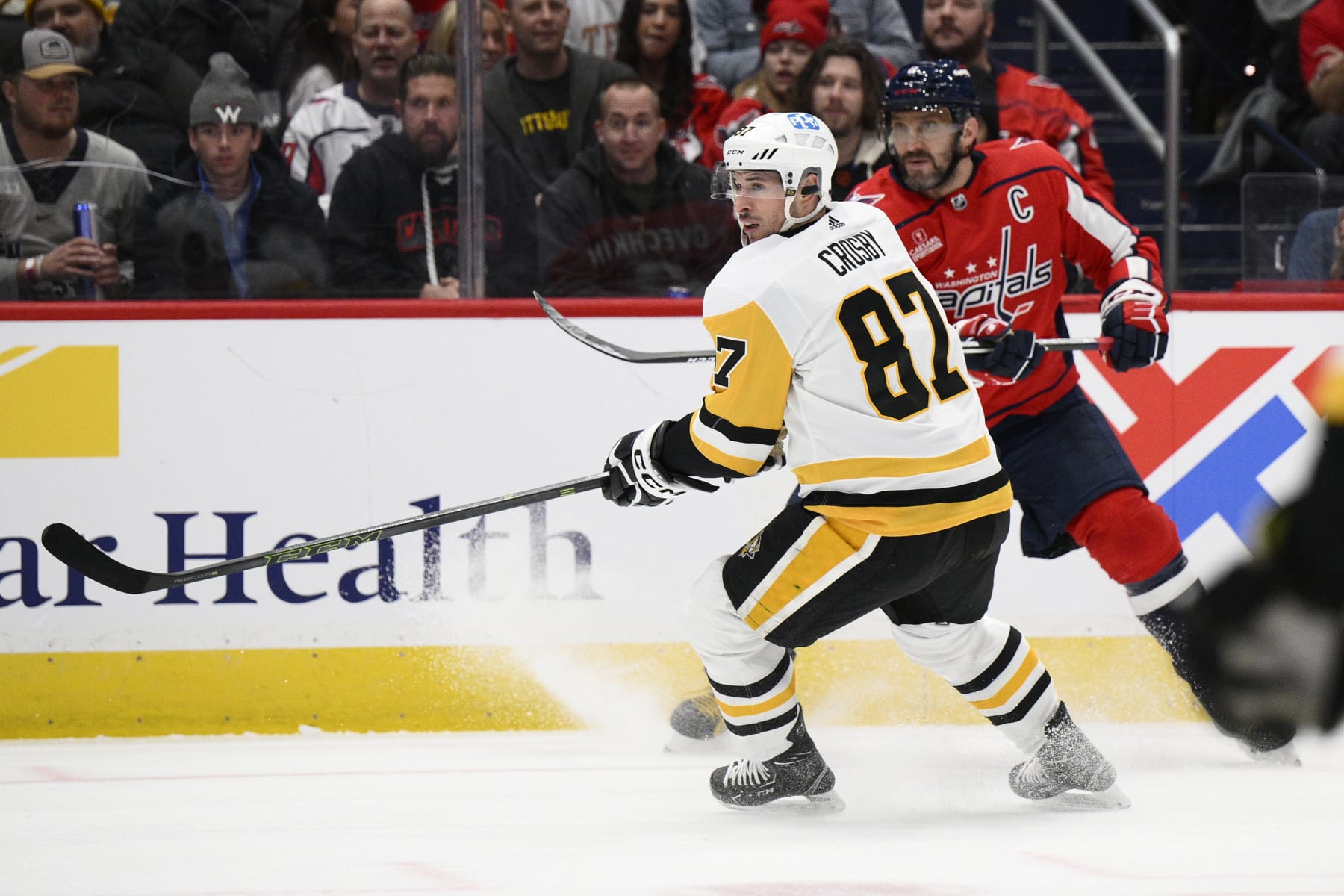 Pittsburgh Penguins center Sidney Crosby (87) and Washington Capitals left wing Alex Ovechkin (8) in action during the first period of an NHL hockey game against the Washington Capitals, Thursday, Jan. 26, 2023, in Washington. (AP Photo/Nick Wass)