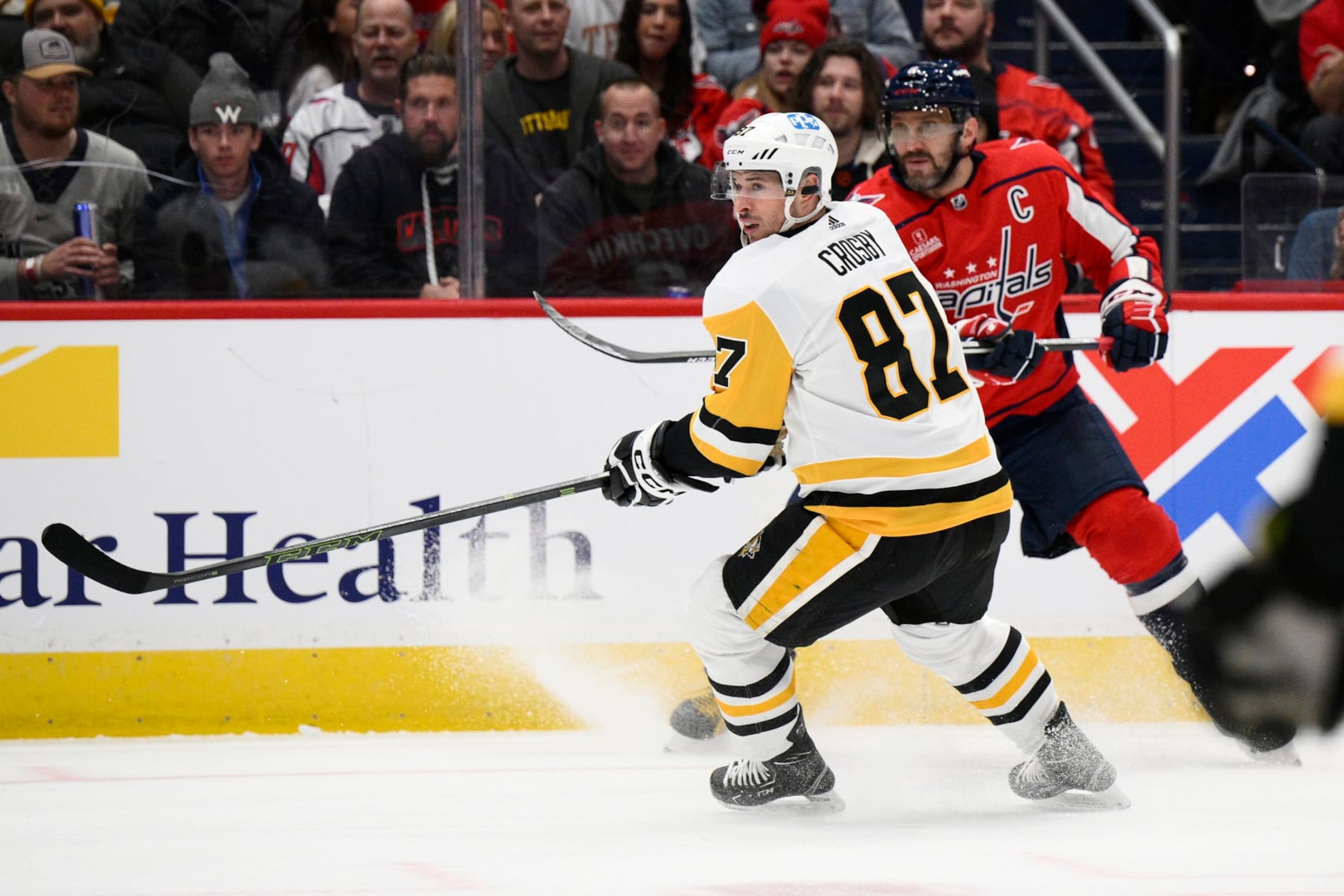 Pittsburgh Penguins center Sidney Crosby (87) and Washington Capitals left wing Alex Ovechkin (8) in action during the first period of an NHL hockey game against the Washington Capitals, Thursday, Jan. 26, 2023, in Washington. (AP Photo/Nick Wass)