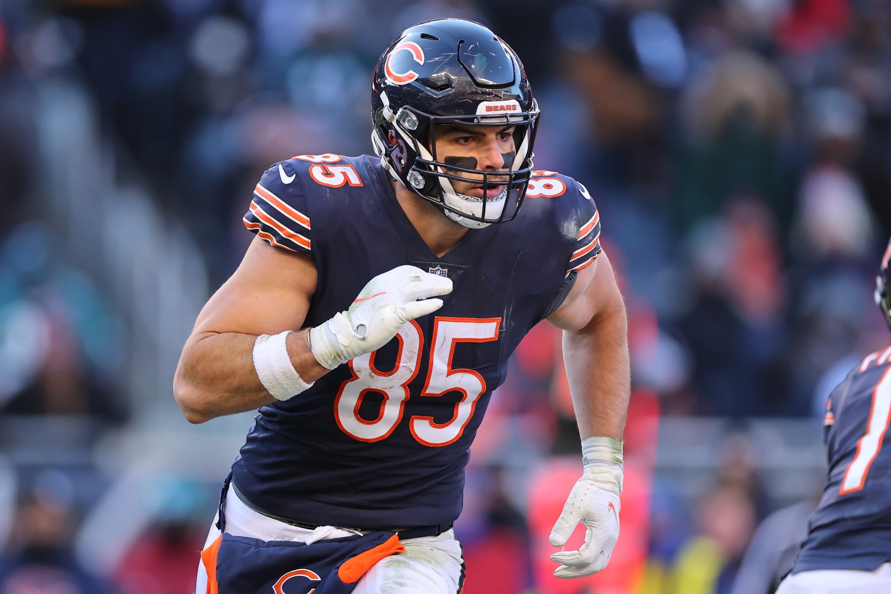 CHICAGO, ILLINOIS - DECEMBER 18: Cole Kmet #85 of the Chicago Bears in action against the Philadelphia Eagles at Soldier Field on December 18, 2022 in Chicago, Illinois. (Photo by Michael Reaves/Getty Images)