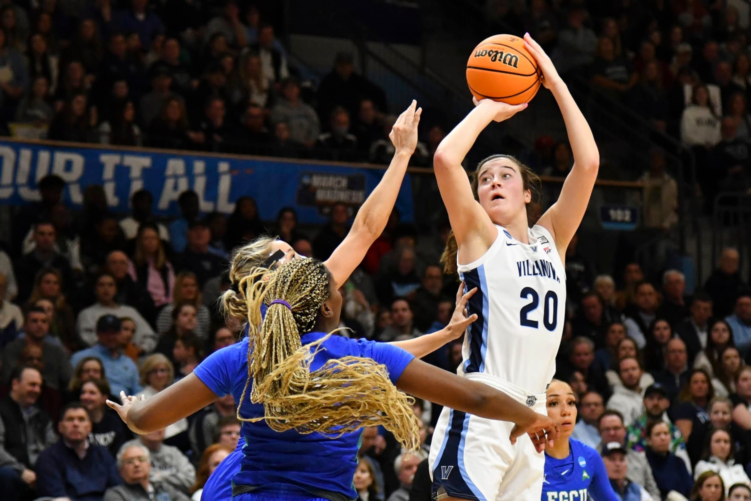 VILLANOVA, PA - MARCH 20: Maddy Siegrist #20 of the Villanova Wildcats shoots the ball over Sophia Stiles #2 and Uju Ezeudu #42 of the Florida Gulf Coast Eagles during the second round of the 2023 NCAA Women's Basketball Tournament held at Finneran Pavilion on March 20, 2023 in Villanova, Pennsylvania. (Photo by Eric Hartline/NCAA Photos via Getty Images)