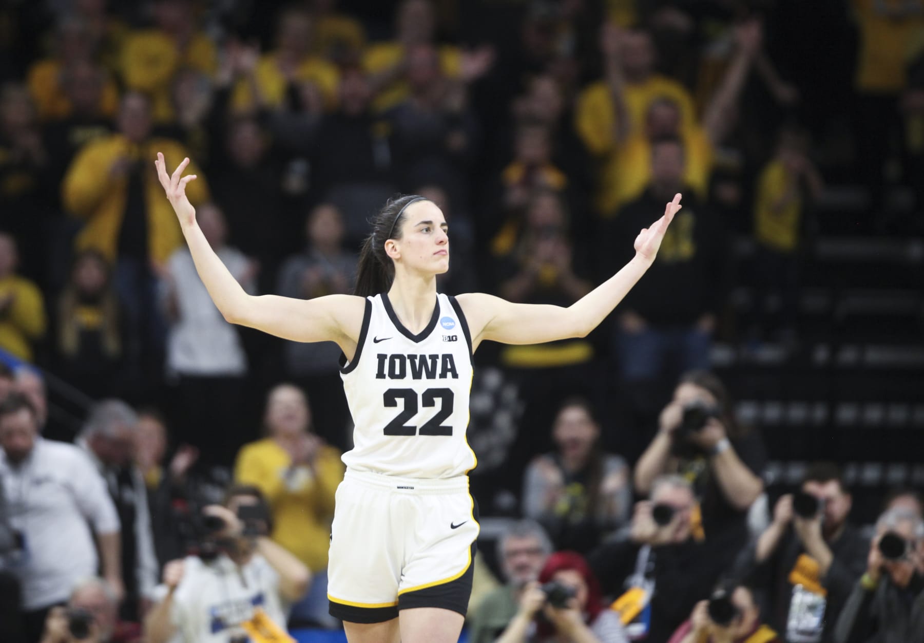 IOWA CITY, IOWA- MARCH 19:  Guard Caitlin Clark #22 of the Iowa Hawkeyes celebrates after a basket against the Georgia Lady Bulldogs late in the second half during the second round of the NCAA Women's Basketball Tournament at Carver-Hawkeye Arena on March 19, 2023 in Iowa City, Iowa.  (Photo by Matthew Holst/Getty Images)