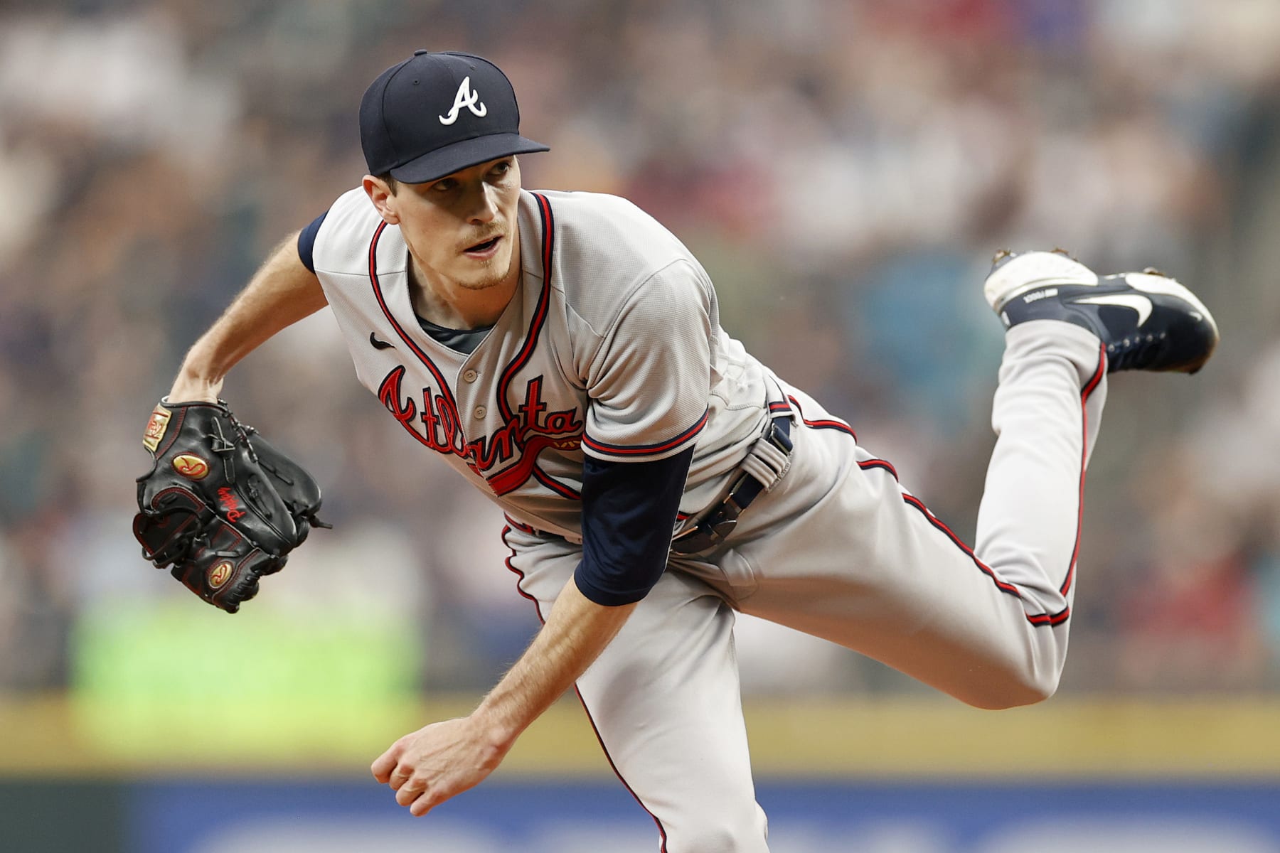 SEATTLE, WASHINGTON - SEPTEMBER 10: Max Fried #54 of the Atlanta Braves pitches during the first inning against the Seattle Mariners at T-Mobile Park on September 10, 2022 in Seattle, Washington. (Photo by Steph Chambers/Getty Images)