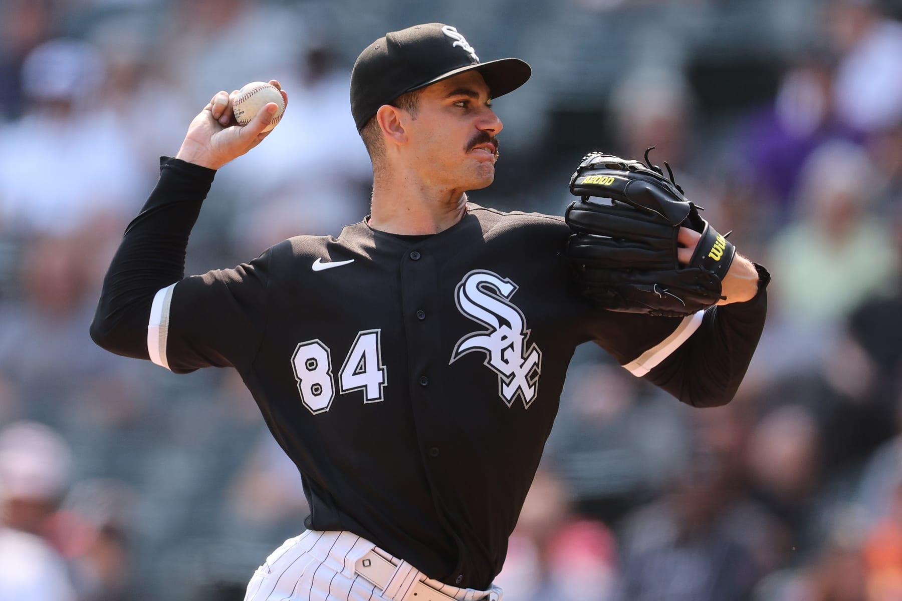 CHICAGO, ILLINOIS - SEPTEMBER 14: Dylan Cease #84 of the Chicago White Sox delivers a pitch against the Colorado Rockies during the third inning at Guaranteed Rate Field on September 14, 2022 in Chicago, Illinois. (Photo by Michael Reaves/Getty Images)
