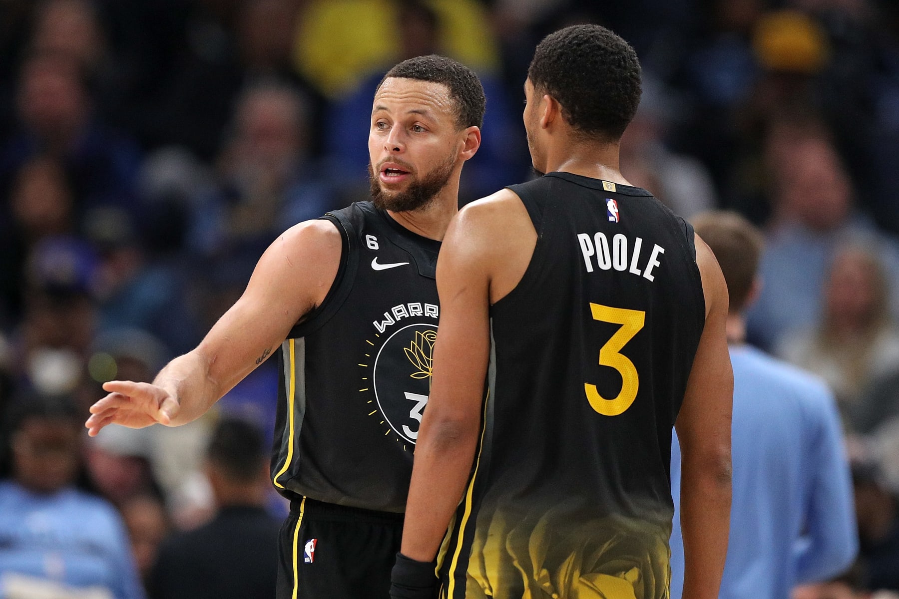 MEMPHIS, TENNESSEE - MARCH 18: Stephen Curry #30 of the Golden State Warriors and Jordan Poole #3 of the Golden State Warriors during the game against the Memphis Grizzlies at FedExForum on March 18, 2023 in Memphis, Tennessee. NOTE TO USER: User expressly acknowledges and agrees that, by downloading and or using this photograph, User is consenting to the terms and conditions of the Getty Images License Agreement. (Photo by Justin Ford/Getty Images)