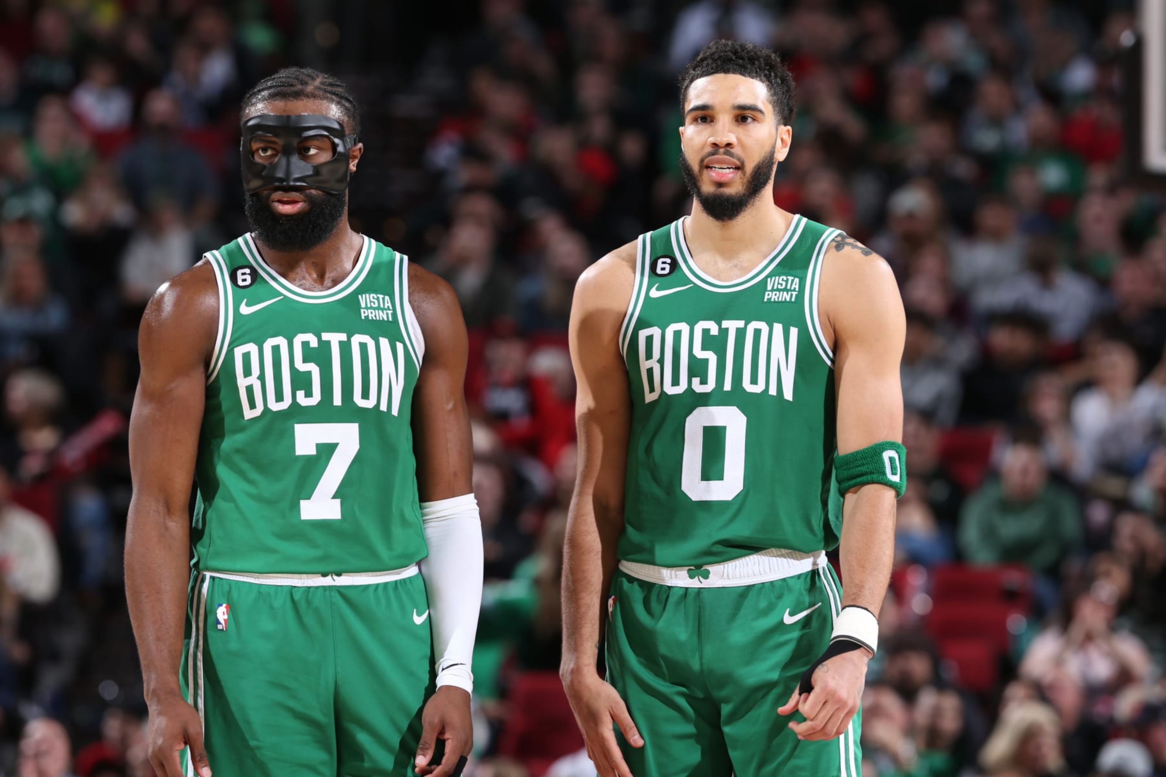PORTLAND, OR - MARCH 17: Jaylen Brown #7 and Jayson Tatum #0 of the Boston Celtics looks on during the game against the Portland Trail Blazers  on March 17, 2023 at the Moda Center Arena in Portland, Oregon. NOTE TO USER: User expressly acknowledges and agrees that, by downloading and or using this photograph, user is consenting to the terms and conditions of the Getty Images License Agreement. Mandatory Copyright Notice: Copyright 2023 NBAE (Photo by Sam Forencich/NBAE via Getty Images)