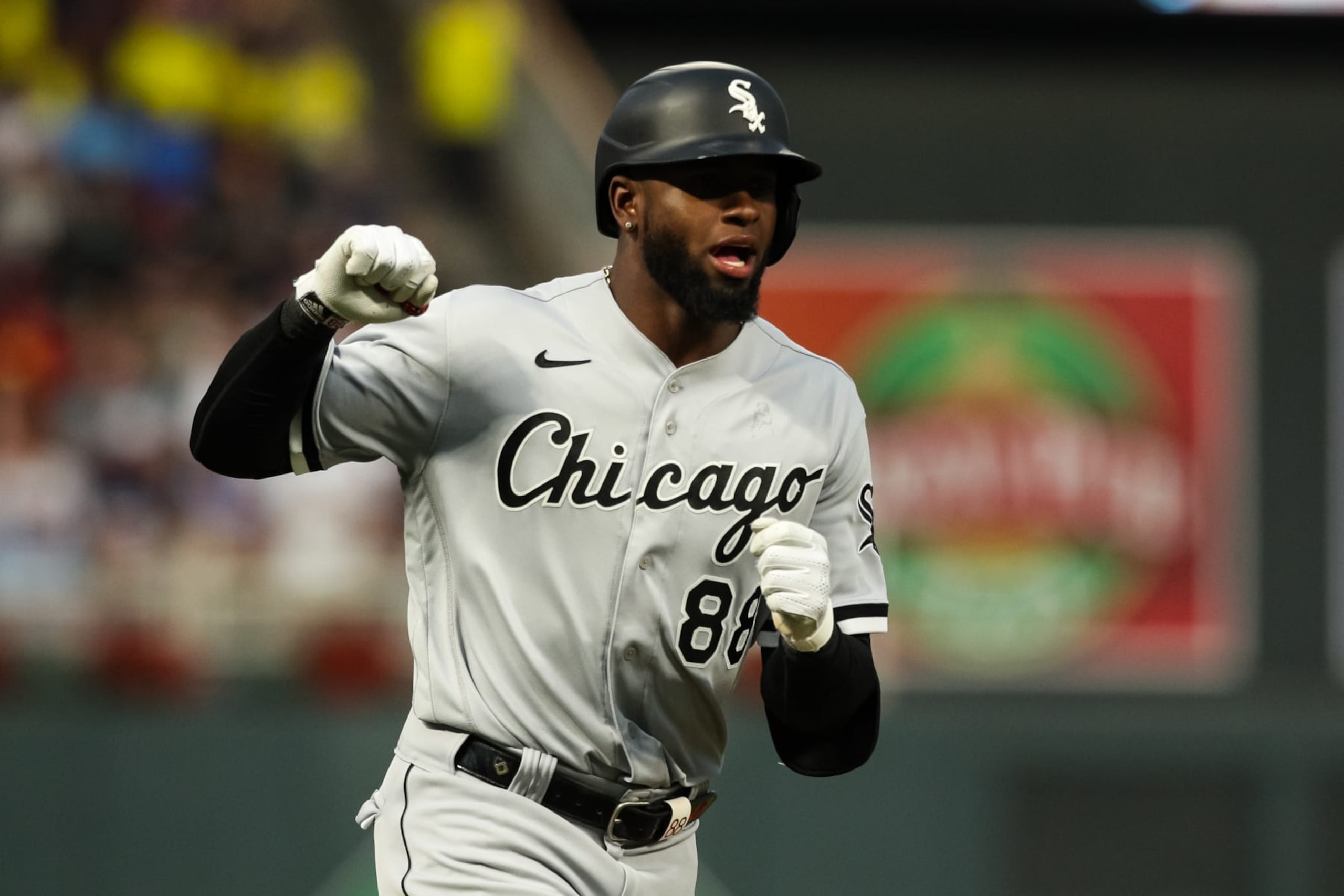 MINNEAPOLIS, MN - JULY 14: Luis Robert #88 of the Chicago White Sox celebrates his grand slam as he rounds the bases against the Minnesota Twins in the fourth inning of the game at Target Field on July 14, 2022 in Minneapolis, Minnesota. The White Sox defeated the Twins 12-2. (Photo by David Berding/Getty Images)