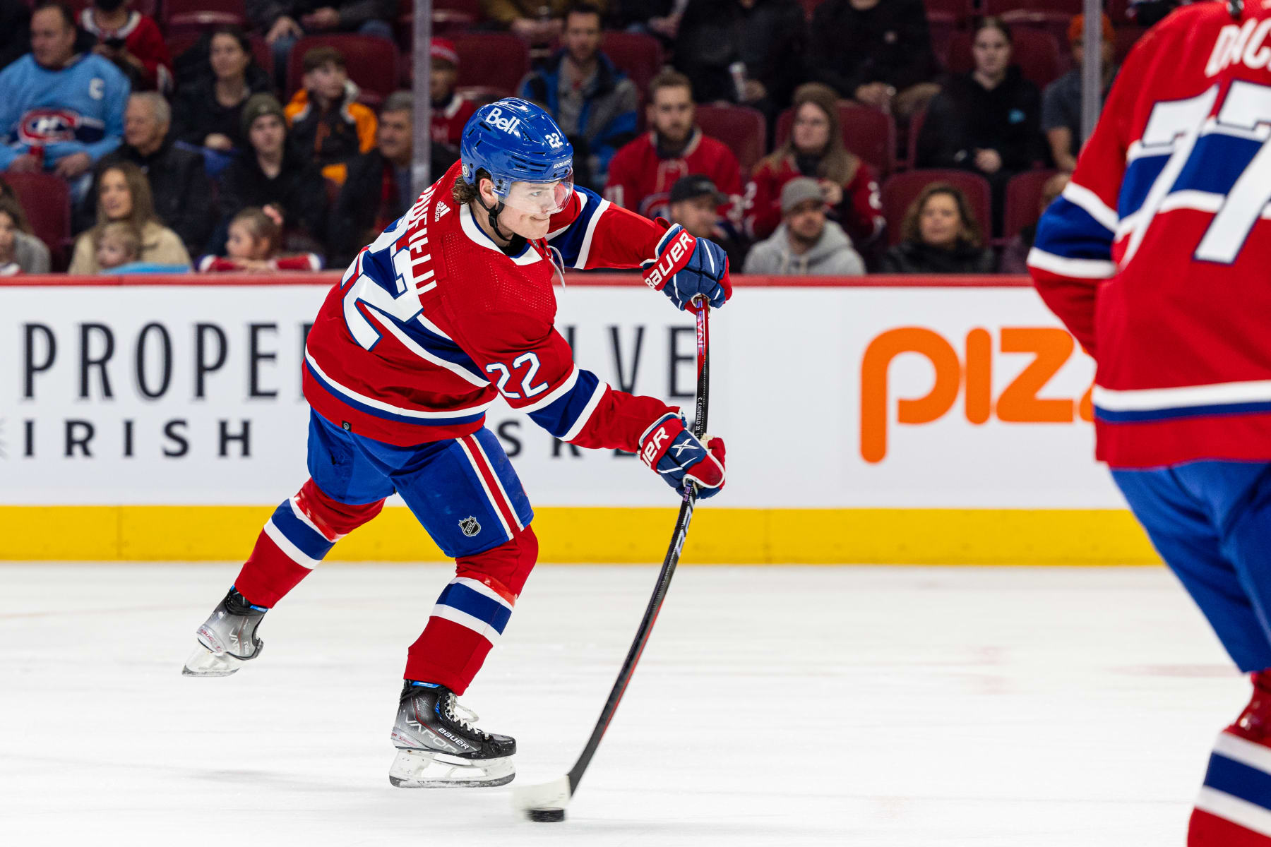 MONTREAL, CANADA - JANUARY 7: Cole Caufield #22 of the Montreal Canadiens takes a shot on goal during the warm-up of the NHL regular season game between the Montreal Canadiens and the St. Louis Blues at the Bell Centre on January 7, 2023 in Montreal, Quebec, Canada. (Photo by Vitor Munhoz/NHLI via Getty Images)
