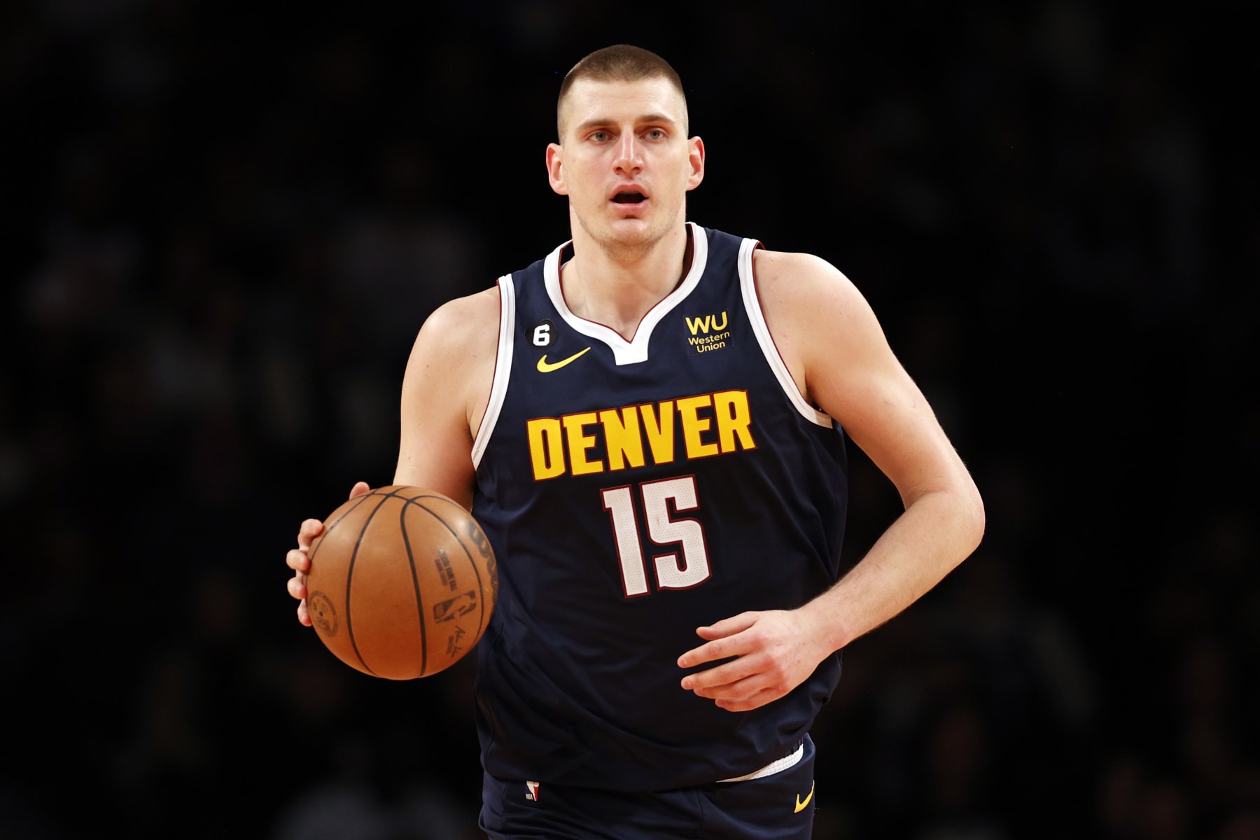 NEW YORK, NEW YORK - MARCH 19: Nikola Jokic #15 of the Denver Nuggets dribbles during the second half against the Brooklyn Nets at Barclays Center on March 19, 2023 in the Brooklyn borough of New York City. The Nuggets won 108-102. NOTE TO USER: User expressly acknowledges and agrees that, by downloading and/or using this photograph, User is consenting to the terms and conditions of the Getty Images License Agreement. (Photo by Sarah Stier/Getty Images)