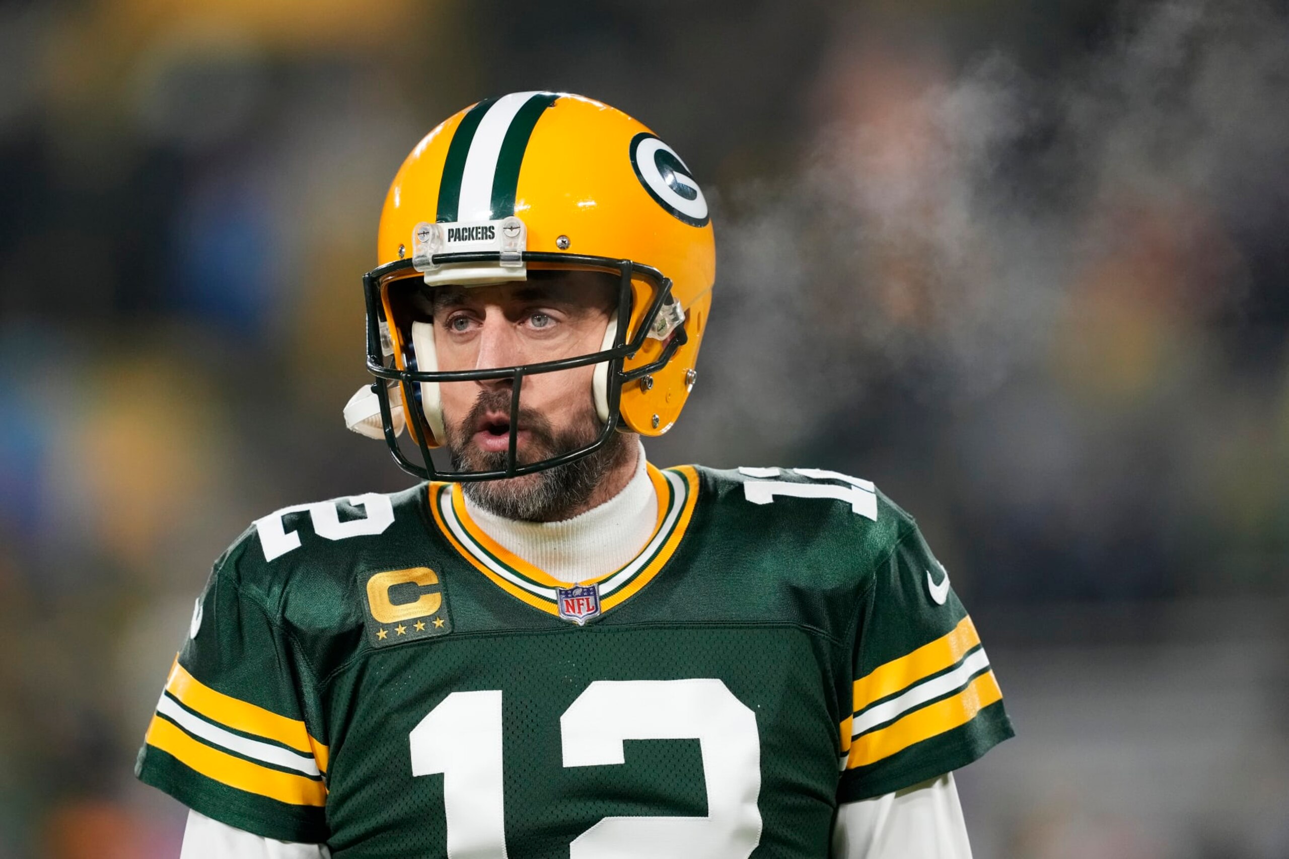GREEN BAY, WISCONSIN - JANUARY 08: Aaron Rodgers #12 of the Green Bay Packers warms up before a game against the Detroit Lions at Lambeau Field on January 08, 2023 in Green Bay, Wisconsin. (Photo by Patrick McDermott/Getty Images) GREEN BAY, WISCONSIN - JANUARY 08: Aaron Rodgers #12 of the Green Bay Packers warms up before a game against the Detroit Lions at Lambeau Field on January 08, 2023 in Green Bay, Wisconsin. (Photo by Patrick McDermott/Getty Images)