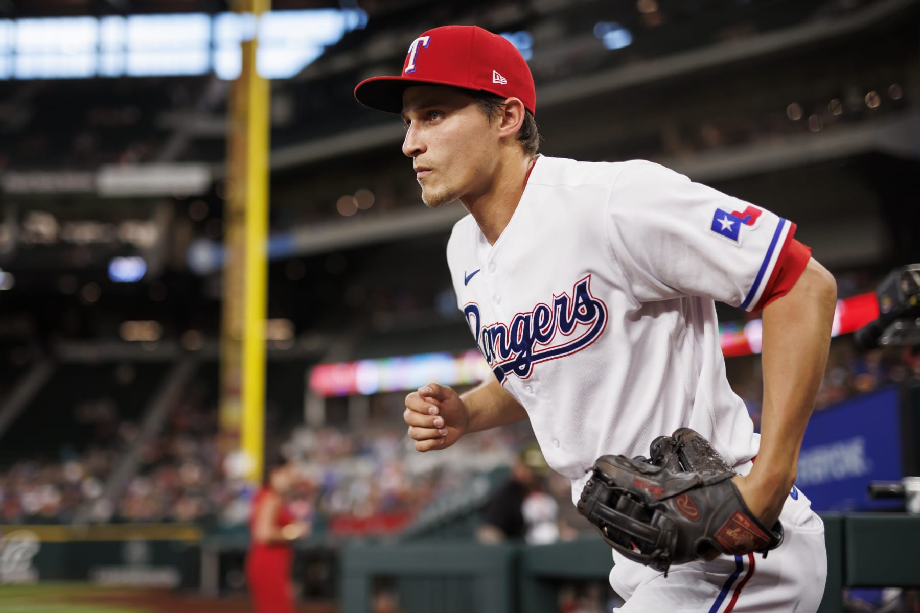 ARLINGTON, TX - JULY 14: Corey Seager #5 of the Texas Rangers runs out of the dugout during a game against the Seattle Mariners at Globe Life Field on July 14, 2022 in Arlington, Texas. (Photo by Ben Ludeman/Texas Rangers/Getty Images)