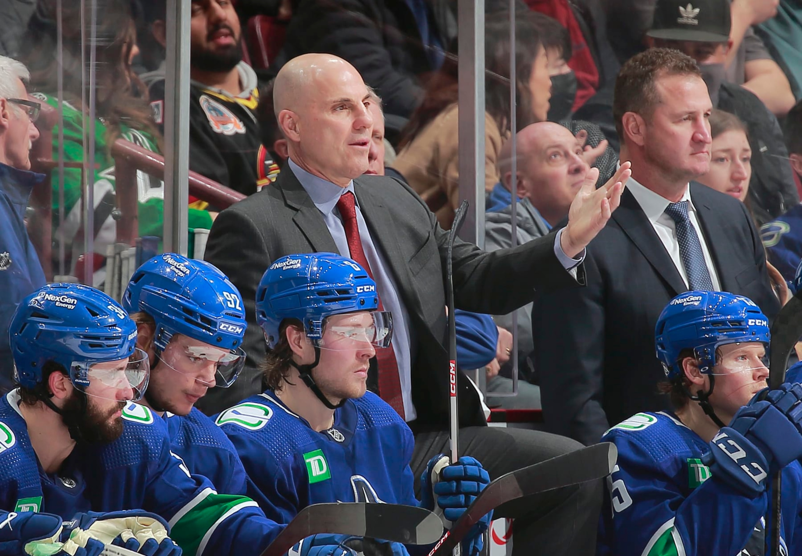 VANCOUVER, CANADA - MARCH 14: Head coach Rick Tocchet of the Vancouver Canucks looks on from the bench
during their NHL game against the Dallas Stars at Rogers Arena March 14, 2023 in Vancouver, British Columbia, Canada.  (Photo by Jeff Vinnick/NHLI via Getty Images)