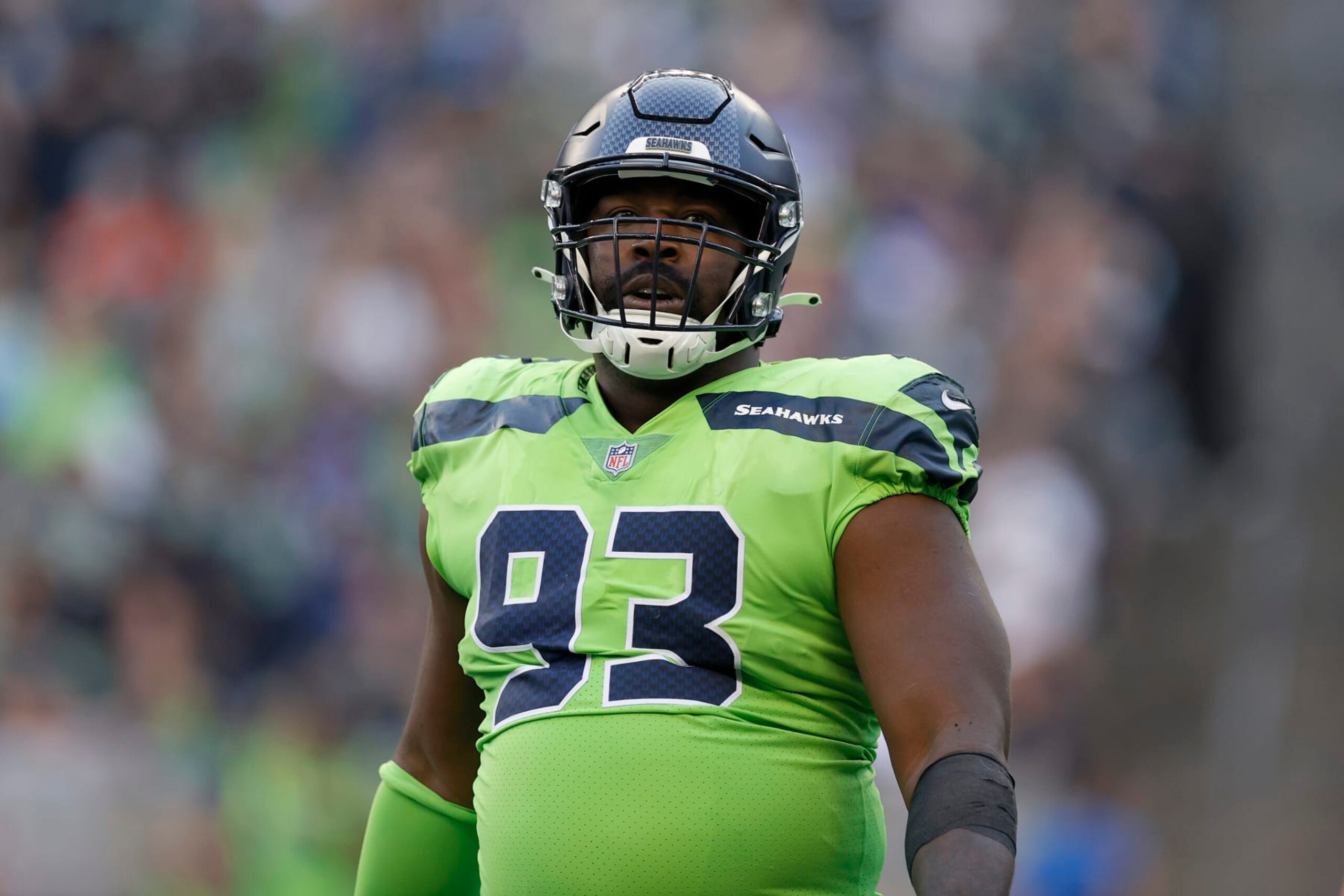 SEATTLE, WASHINGTON - SEPTEMBER 12: Shelby Harris #93 of the Seattle Seahawks looks on during the third quarter against the Denver Broncos at Lumen Field on September 12, 2022 in Seattle, Washington. (Photo by Steph Chambers/Getty Images)