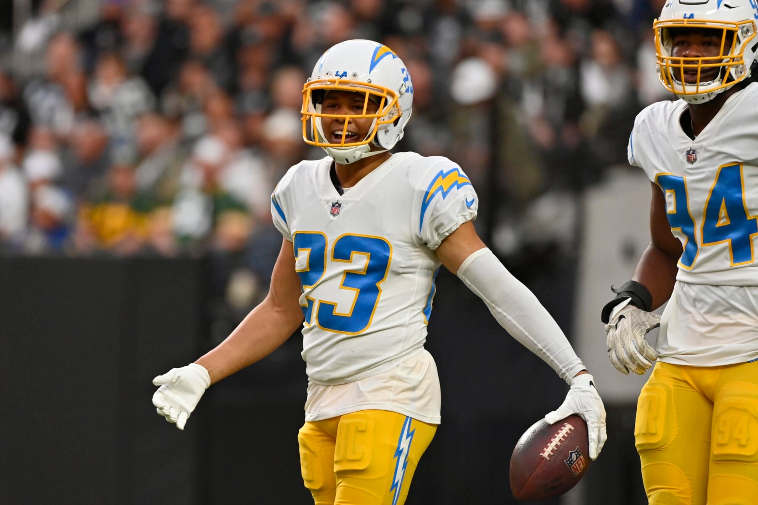Los Angeles Chargers cornerback Bryce Callahan (23) reacts after returning an interception for a touchdown during the first half of an NFL football game against the Las Vegas Raiders, Sunday, Dec. 4, 2022, in Las Vegas. (AP Photo/David Becker)