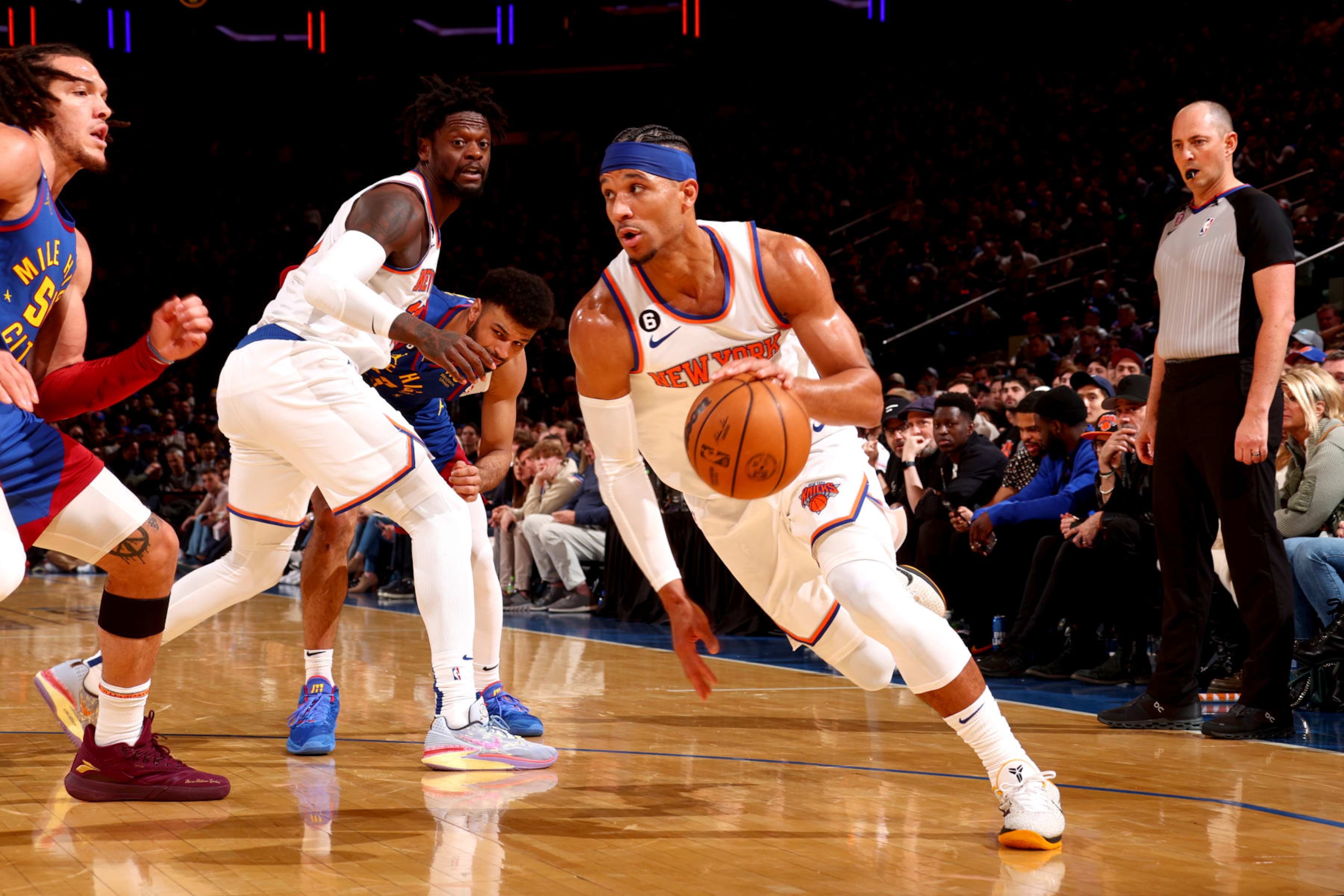 NEW YORK, NY - MARCH 18: Josh Hart #3 of the New York Knicks moves the ball during the game against the Denver Nuggets on March 18, 2023 at Madison Square Garden in New York City, New York.  NOTE TO USER: User expressly acknowledges and agrees that, by downloading and or using this photograph, User is consenting to the terms and conditions of the Getty Images License Agreement. Mandatory Copyright Notice: Copyright 2023 NBAE  (Photo by Nathaniel S. Butler/NBAE via Getty Images)
